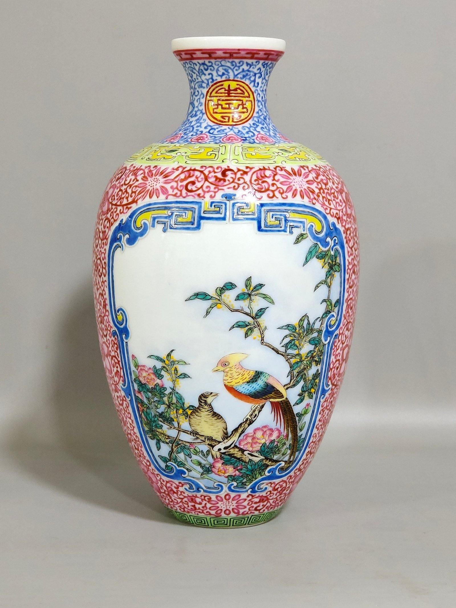 Qing Dynasty Qianlong enamel pine crane golden pheasant and plum vase
