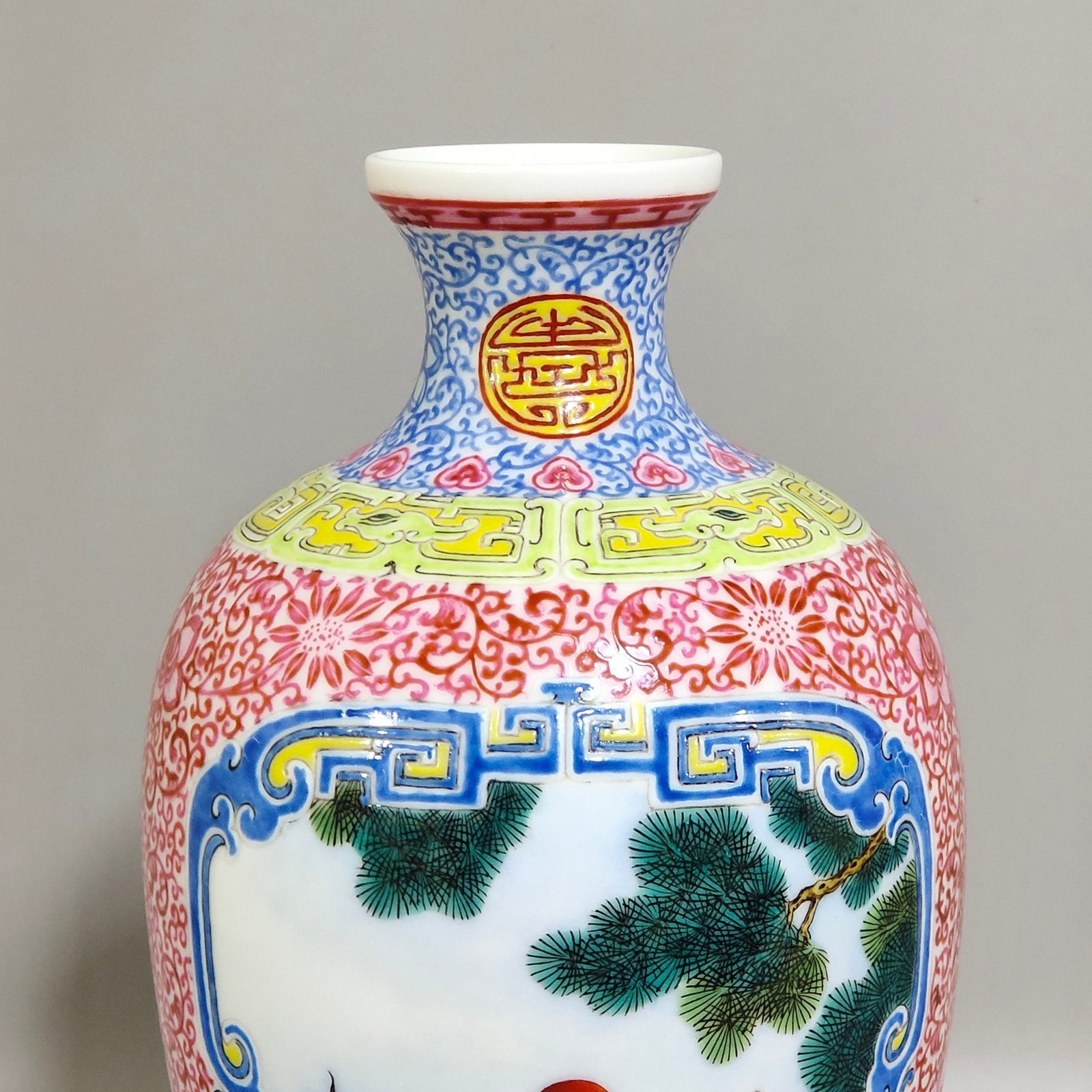 Qing Dynasty Qianlong enamel pine crane golden pheasant and plum vase