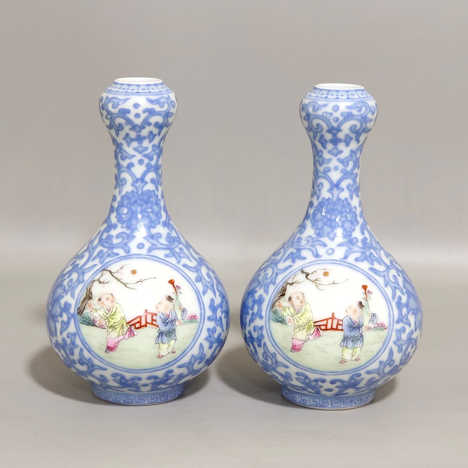 Qing Dynasty Qianlong enamel emerald blue windowed boy’s vase