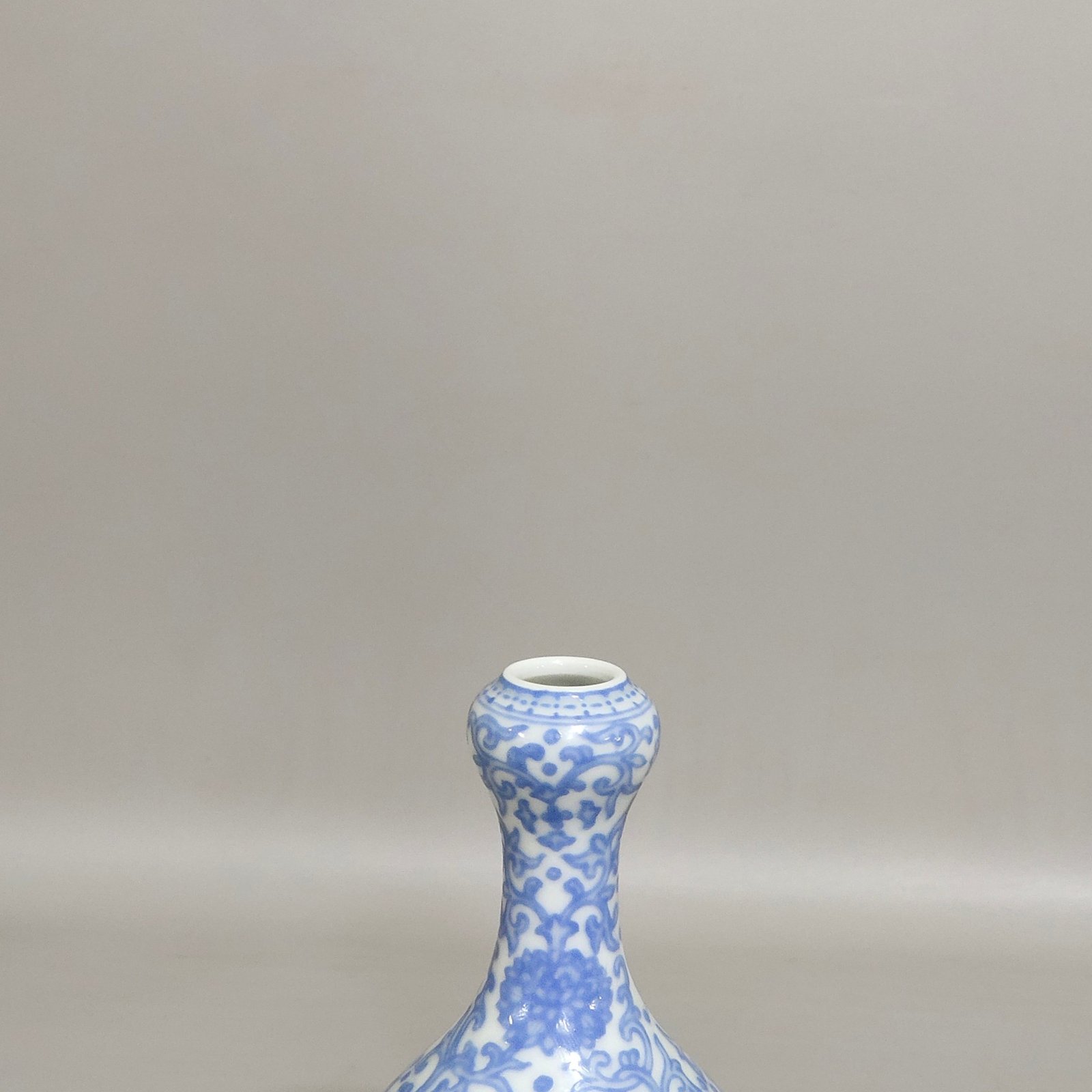 Qing Dynasty Qianlong enamel emerald blue windowed boy’s vase