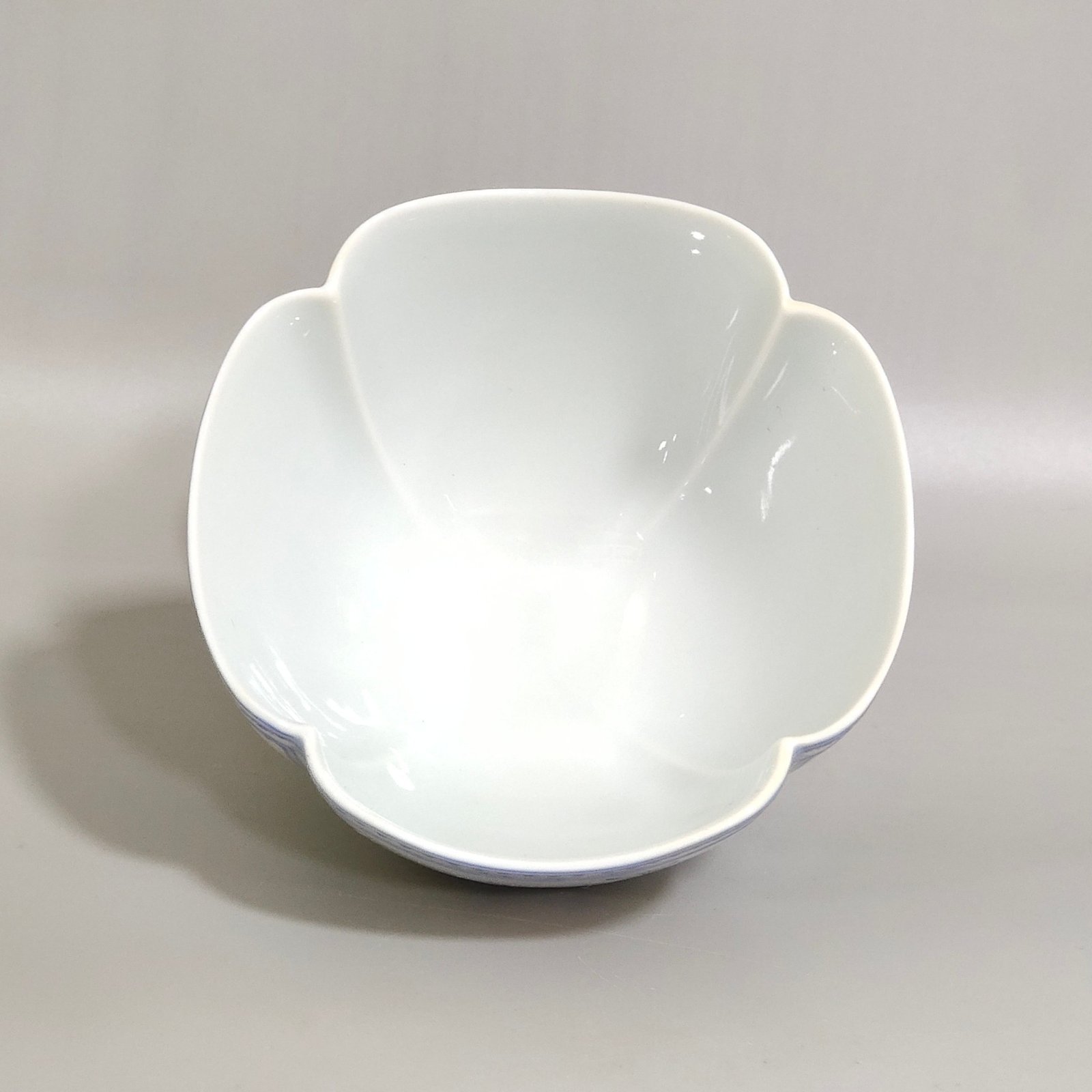 Qing Dynasty Qianlong enamel green-edged window four-season flower cup