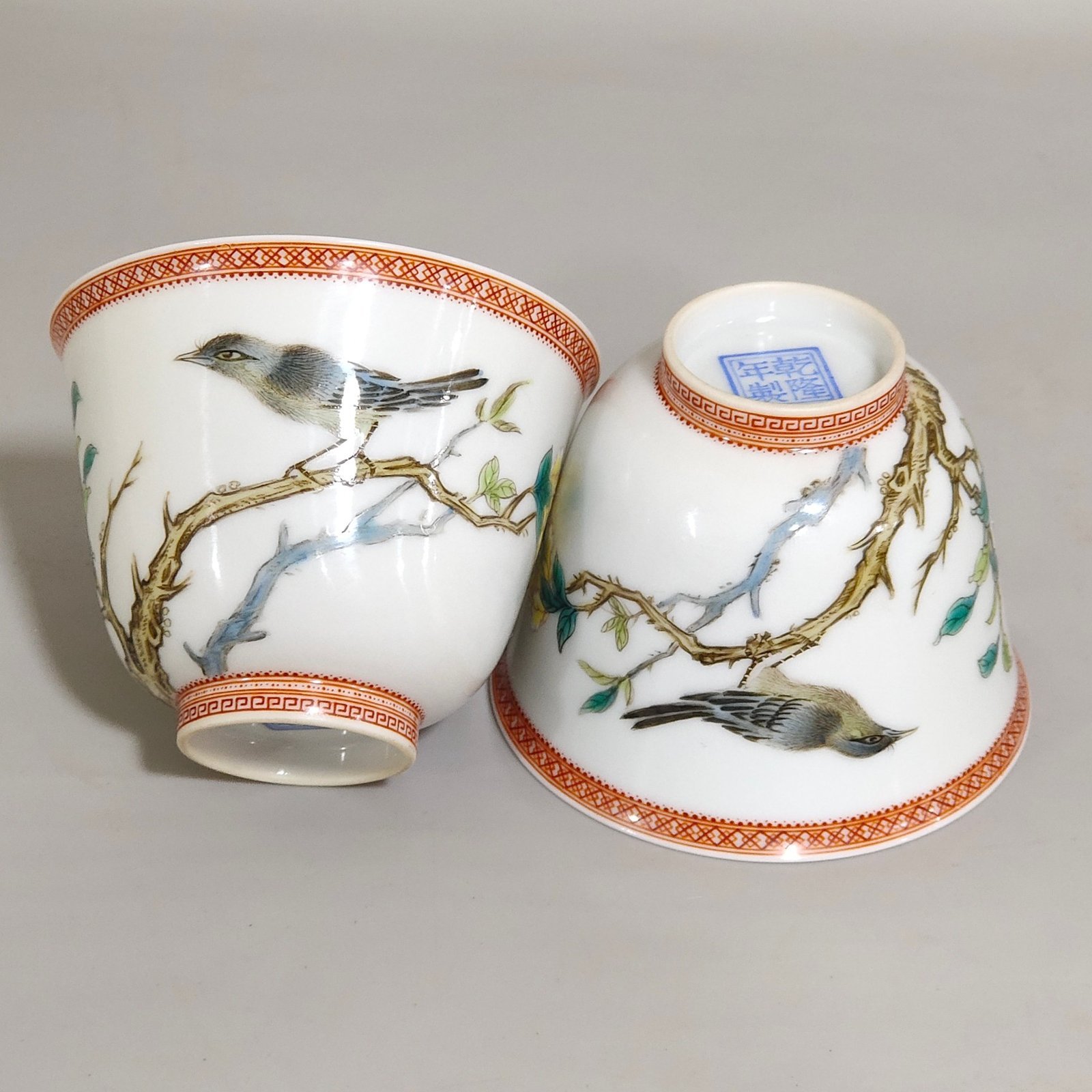 Qing Dynasty Qianlong enamel cup with flowers and birds inscribed with poems