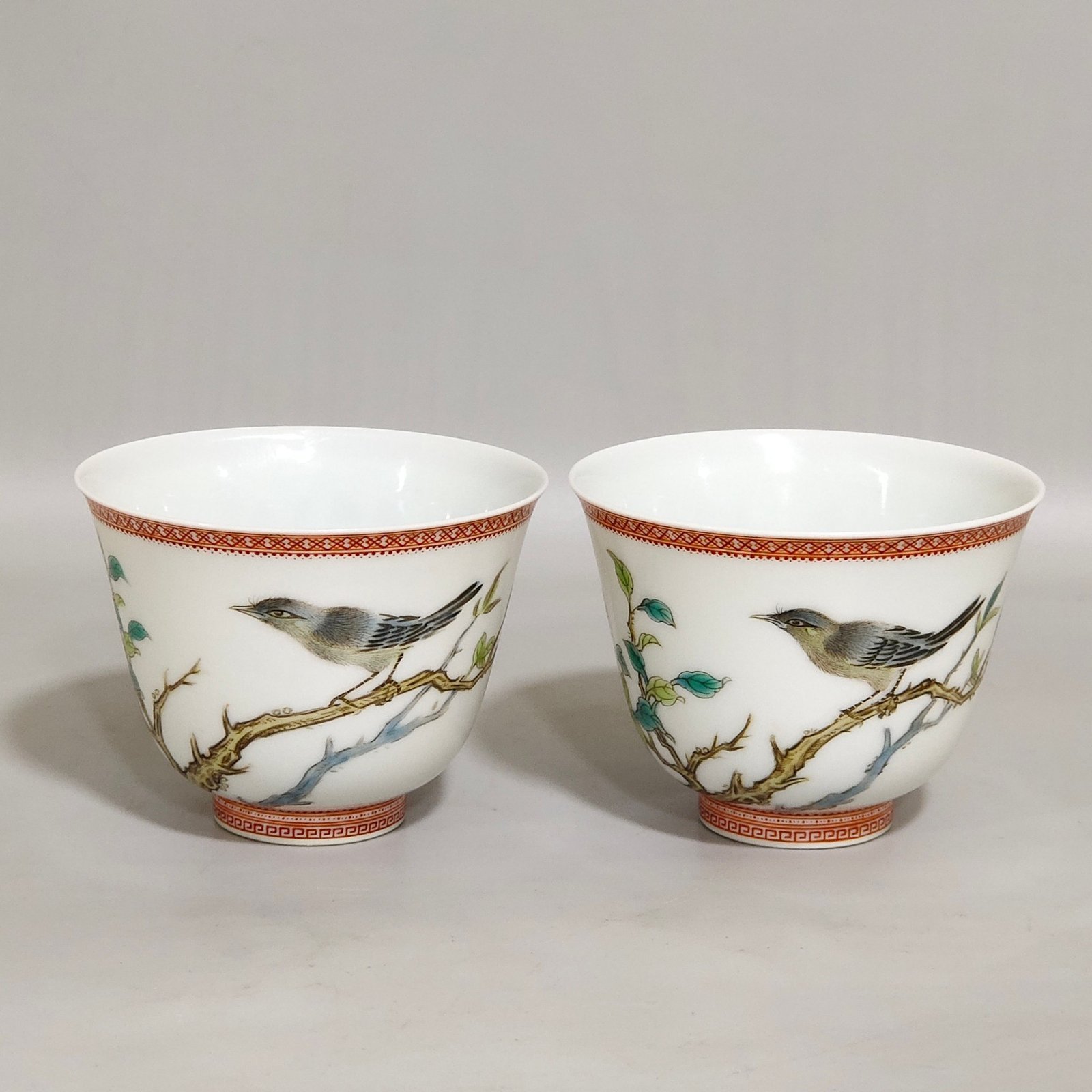 Qing Dynasty Qianlong enamel cup with flowers and birds inscribed with poems