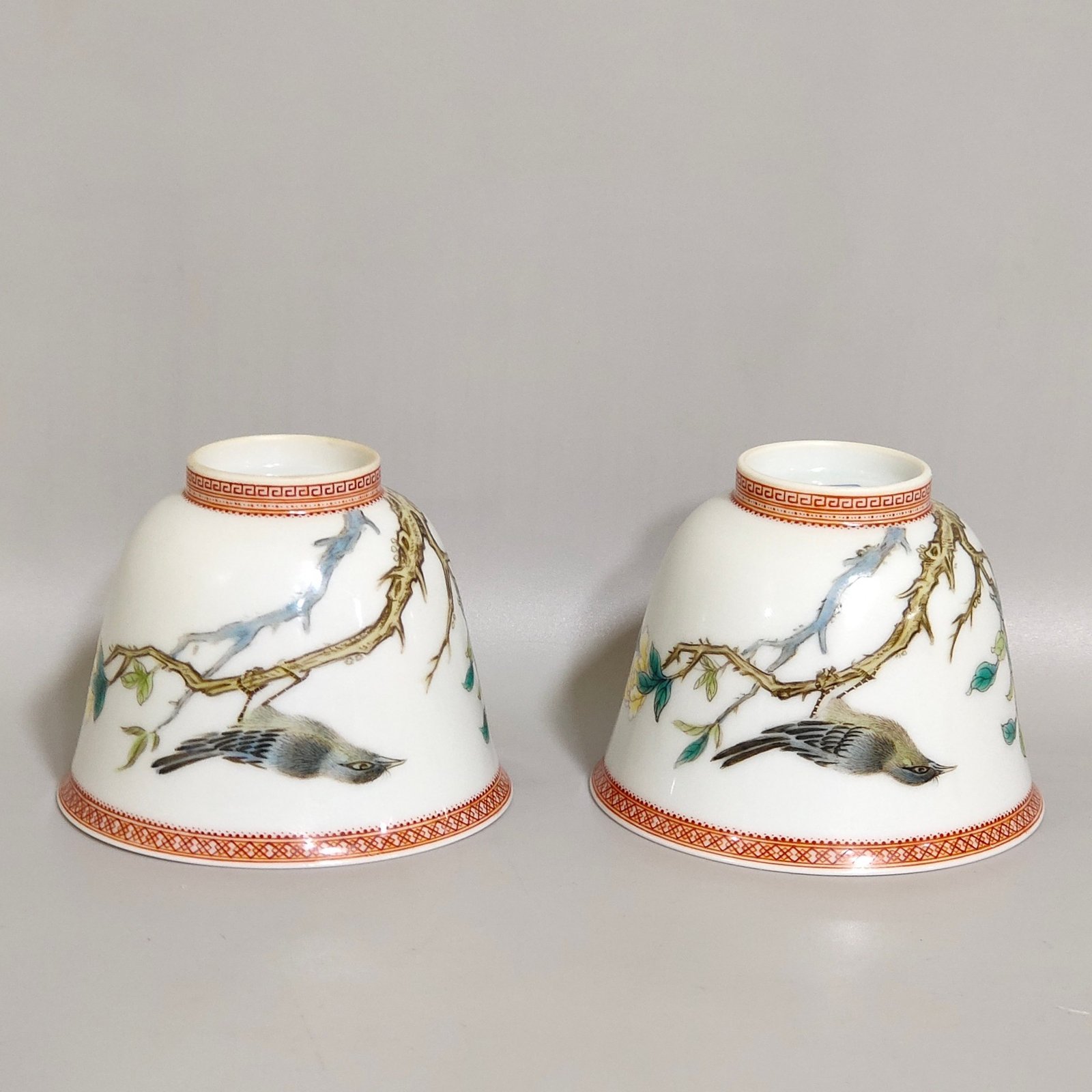 Qing Dynasty Qianlong enamel cup with flowers and birds inscribed with poems