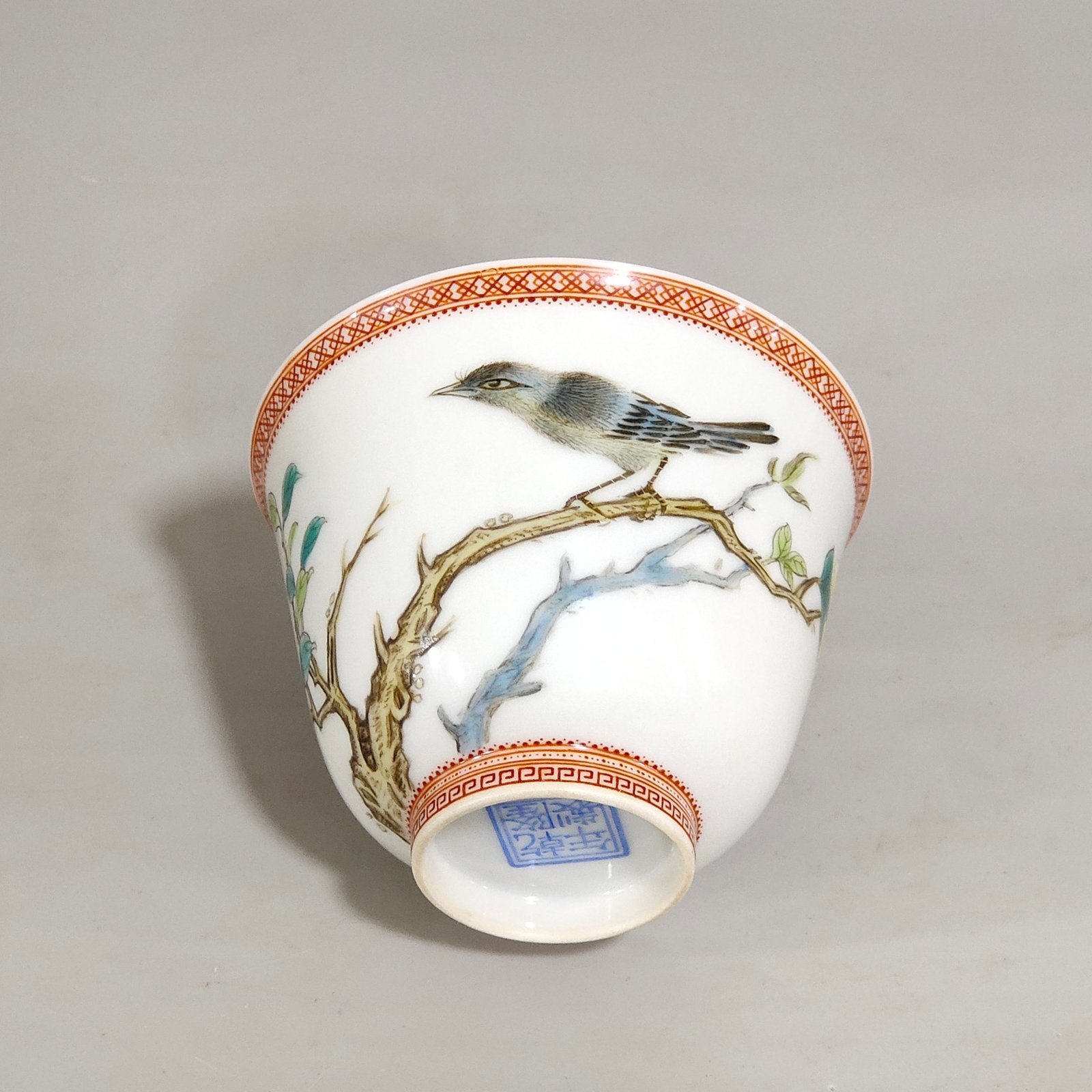 Qing Dynasty Qianlong enamel cup with flowers and birds inscribed with poems
