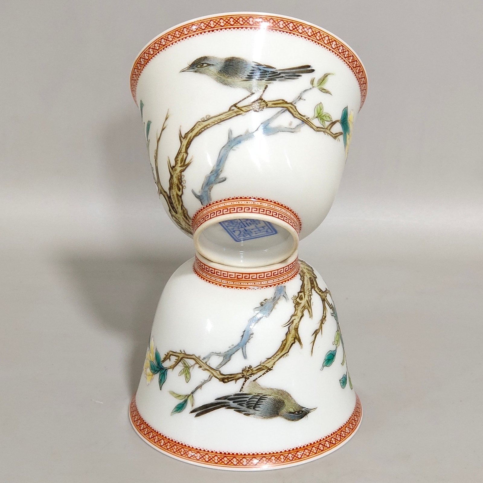 Qing Dynasty Qianlong enamel cup with flowers and birds inscribed with poems