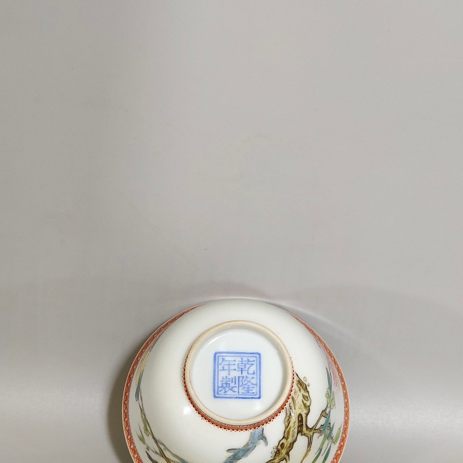 Qing Dynasty Qianlong enamel cup with flowers and birds inscribed with poems