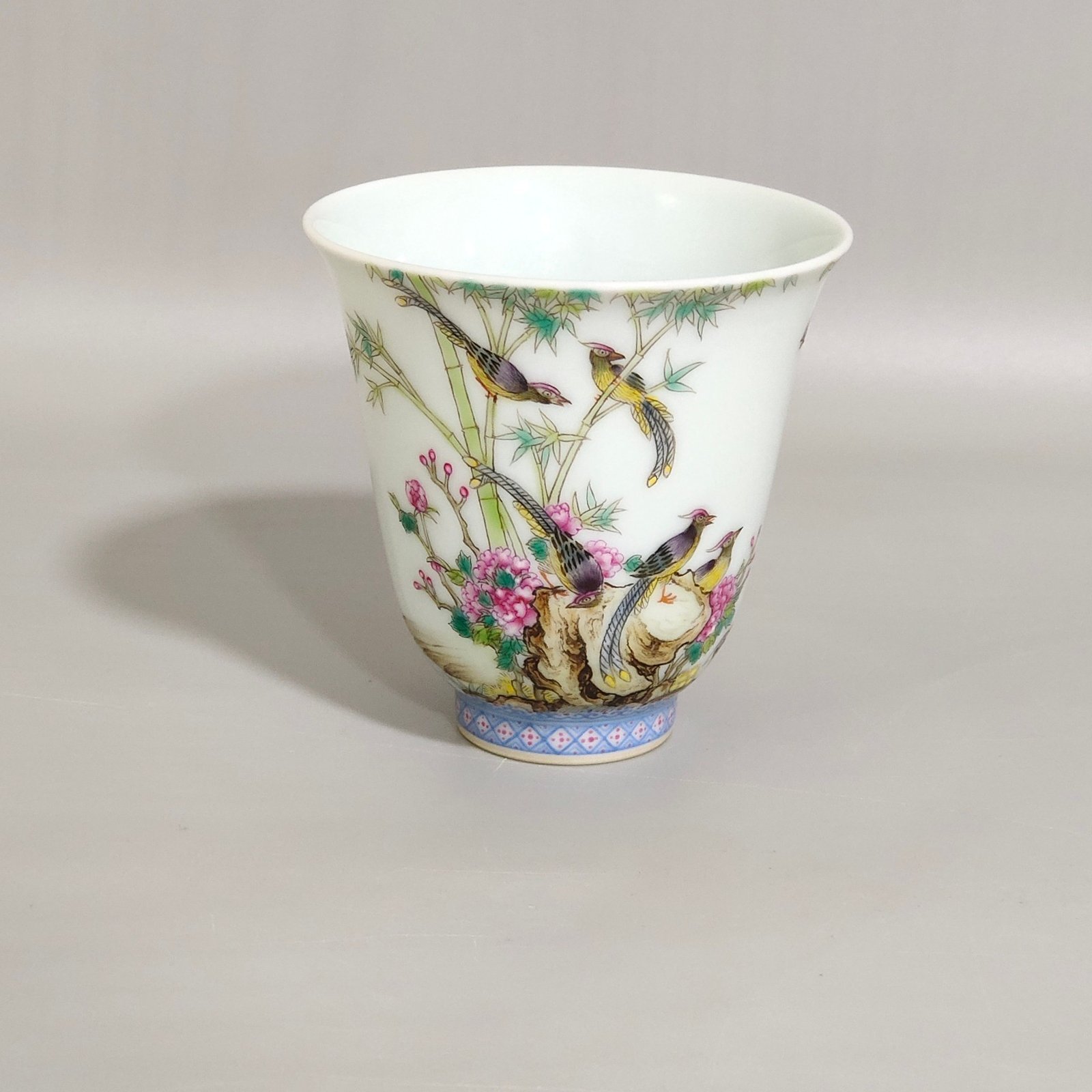 Qing Dynasty Qianlong enamel bell cup with poems about flowers and birds