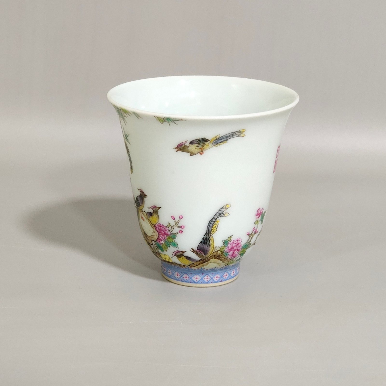 Qing Dynasty Qianlong enamel bell cup with poems about flowers and birds