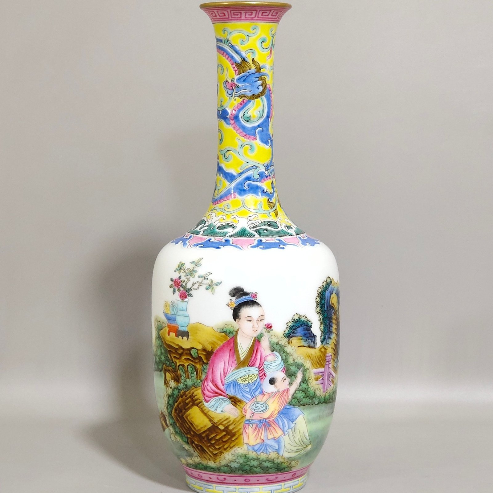 Qing Dynasty Qianlong enamel red dragon piercing flowers Western figure flask