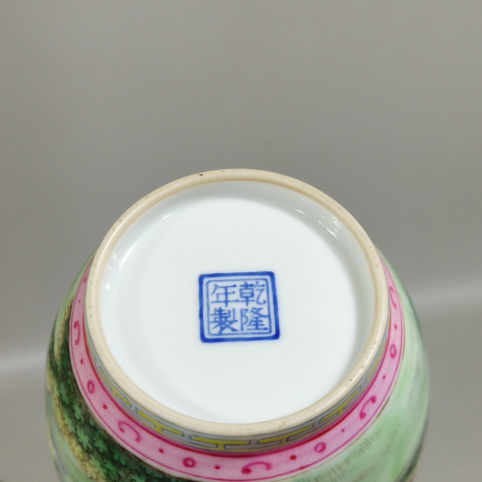 Qing Dynasty Qianlong enamel red dragon piercing flowers Western figure flask
