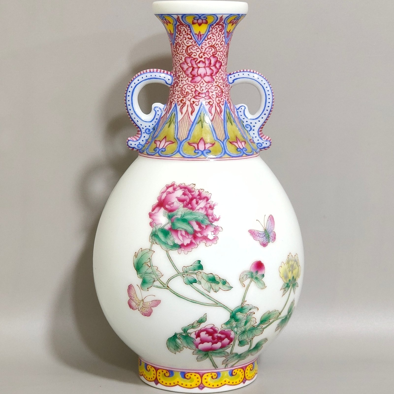 Qing Dynasty Qianlong enamel Castiglione flower double eared jade spring vase