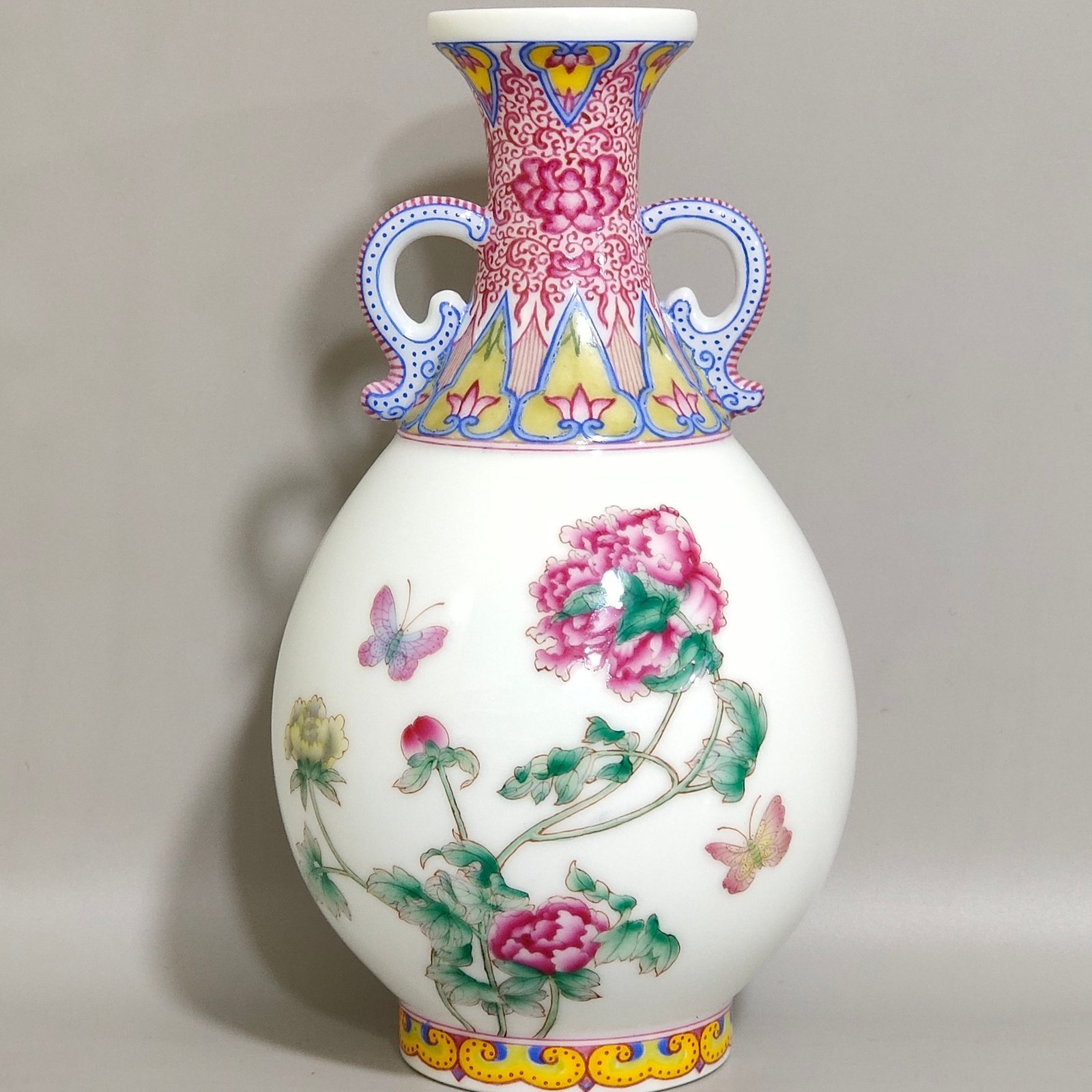 Qing Dynasty Qianlong enamel Castiglione flower double eared jade spring vase