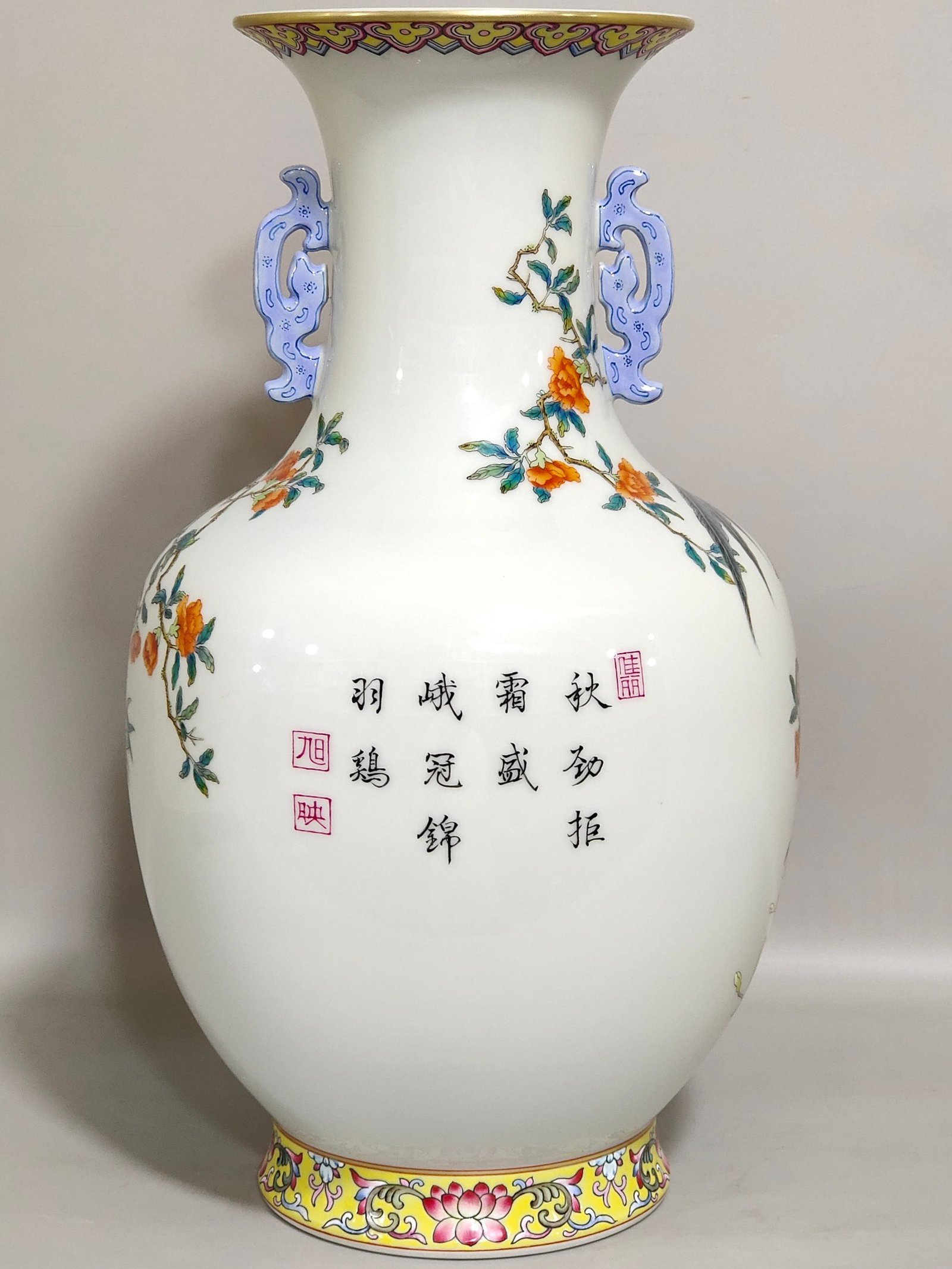 Qing Dynasty Qianlong pomegranate flower and golden pheasant double eared poem vase