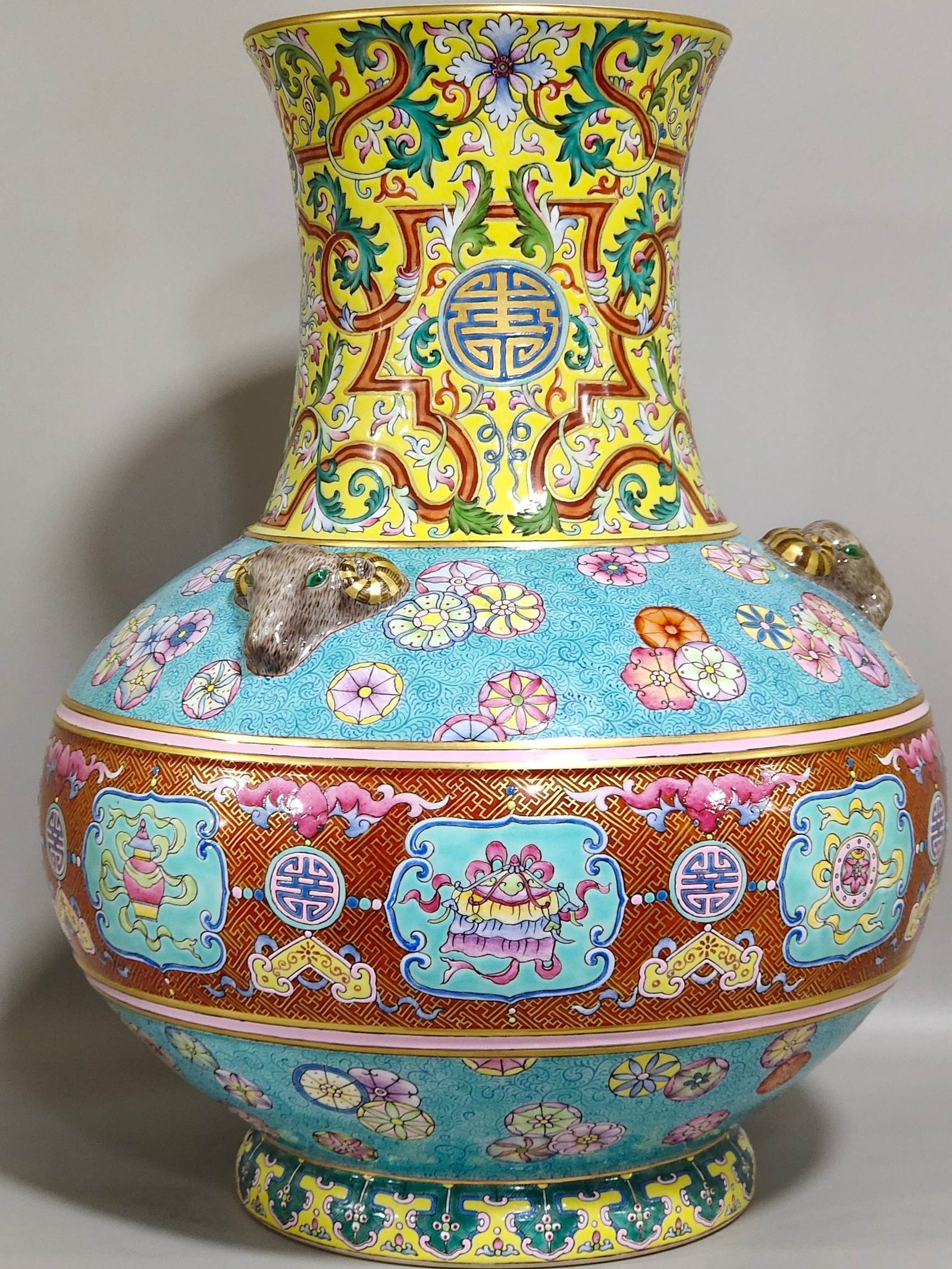 Qing Dynasty Qianlong blessing and longevity Kaitai vase with eight treasures pattern and three sheep