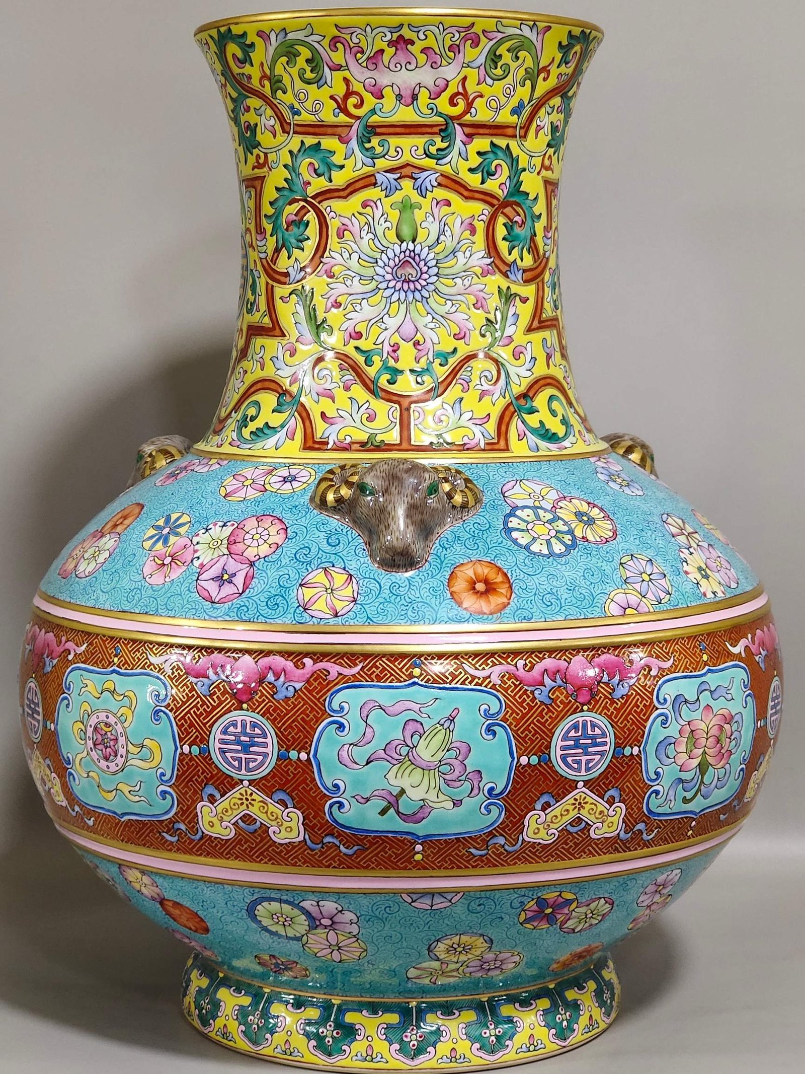 Qing Dynasty Qianlong blessing and longevity Kaitai vase with eight treasures pattern and three sheep