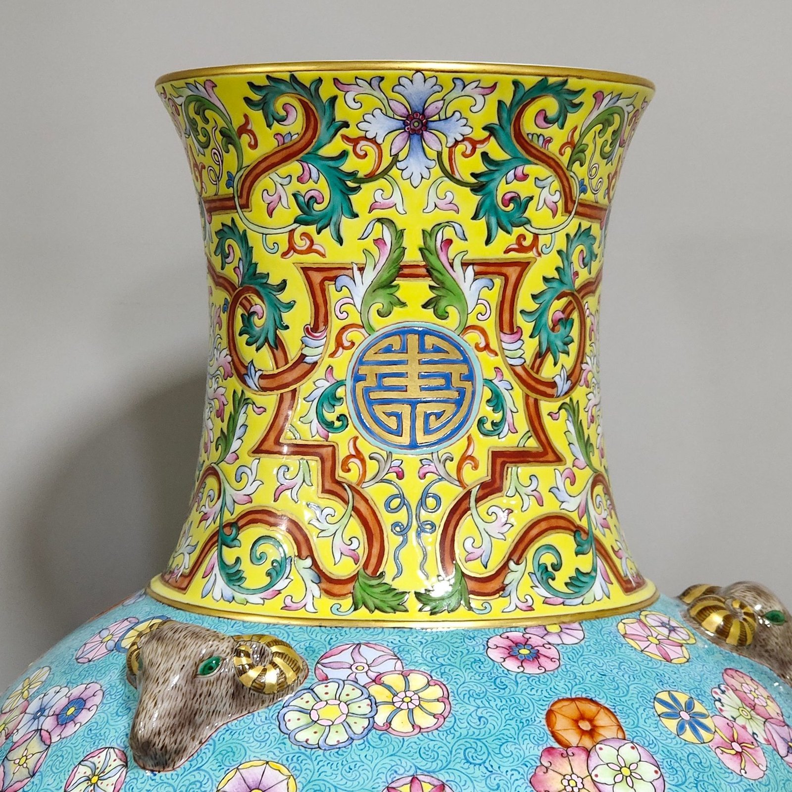 Qing Dynasty Qianlong blessing and longevity Kaitai vase with eight treasures pattern and three sheep
