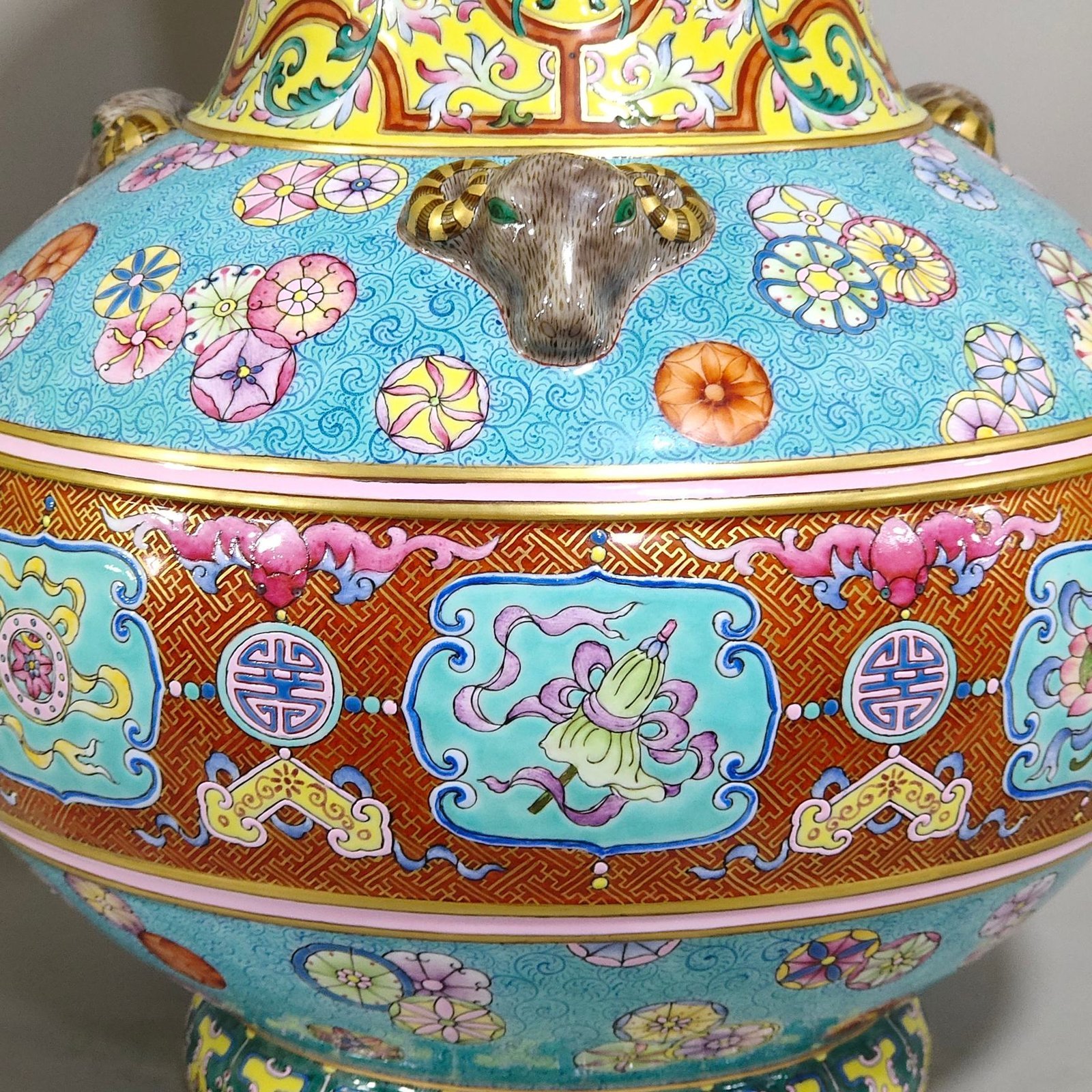 Qing Dynasty Qianlong blessing and longevity Kaitai vase with eight treasures pattern and three sheep