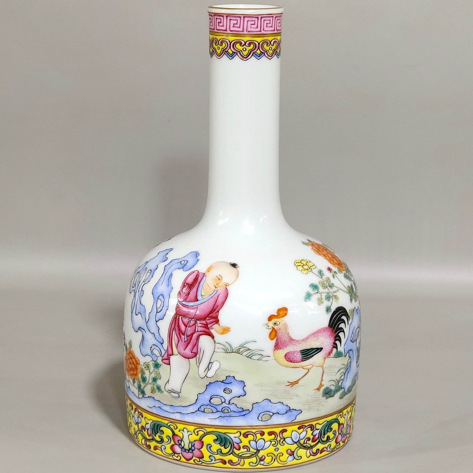Qing Dynasty Qianlong boy’s cockfighting poem and ringing bell statue