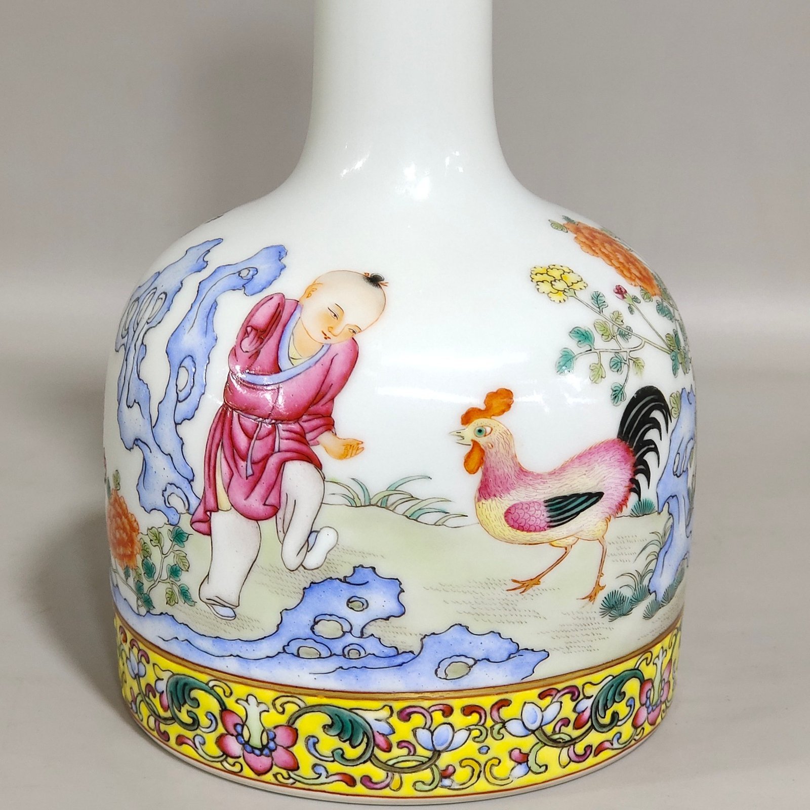 Qing Dynasty Qianlong boy’s cockfighting poem and ringing bell statue
