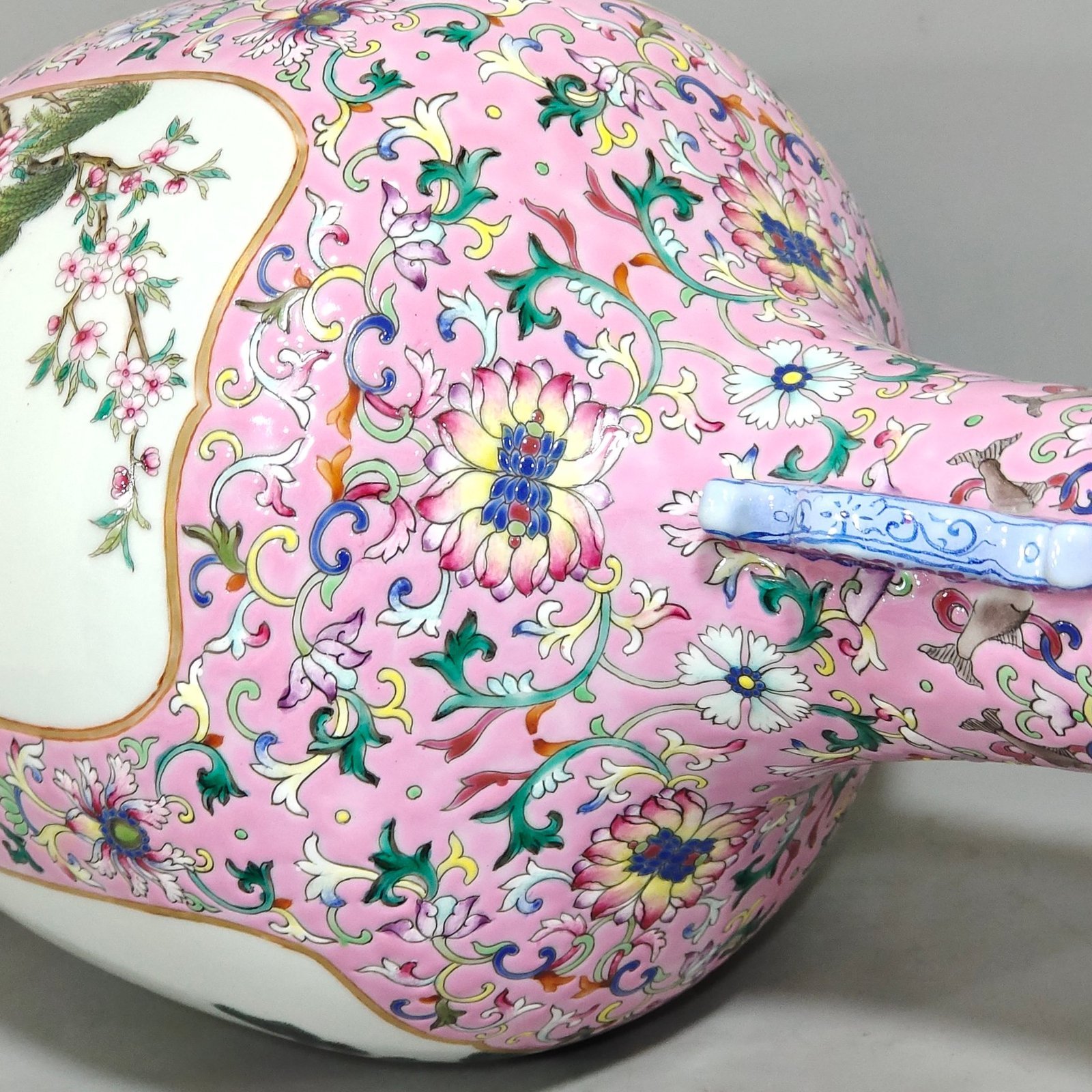 Qing Dynasty Qianlong pink windowed four season flower amphorae