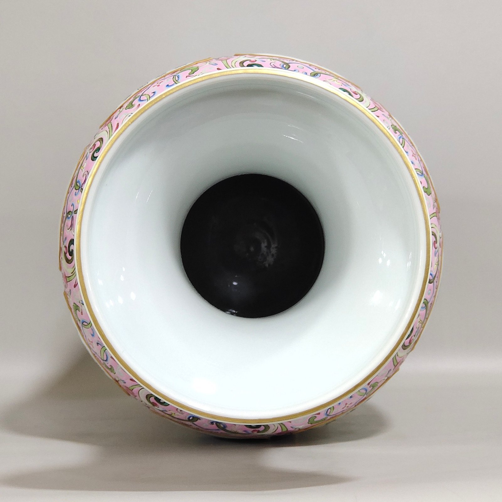 Qing Dynasty Qianlong a pink window opened vase inscribed with flowers of the four seasons