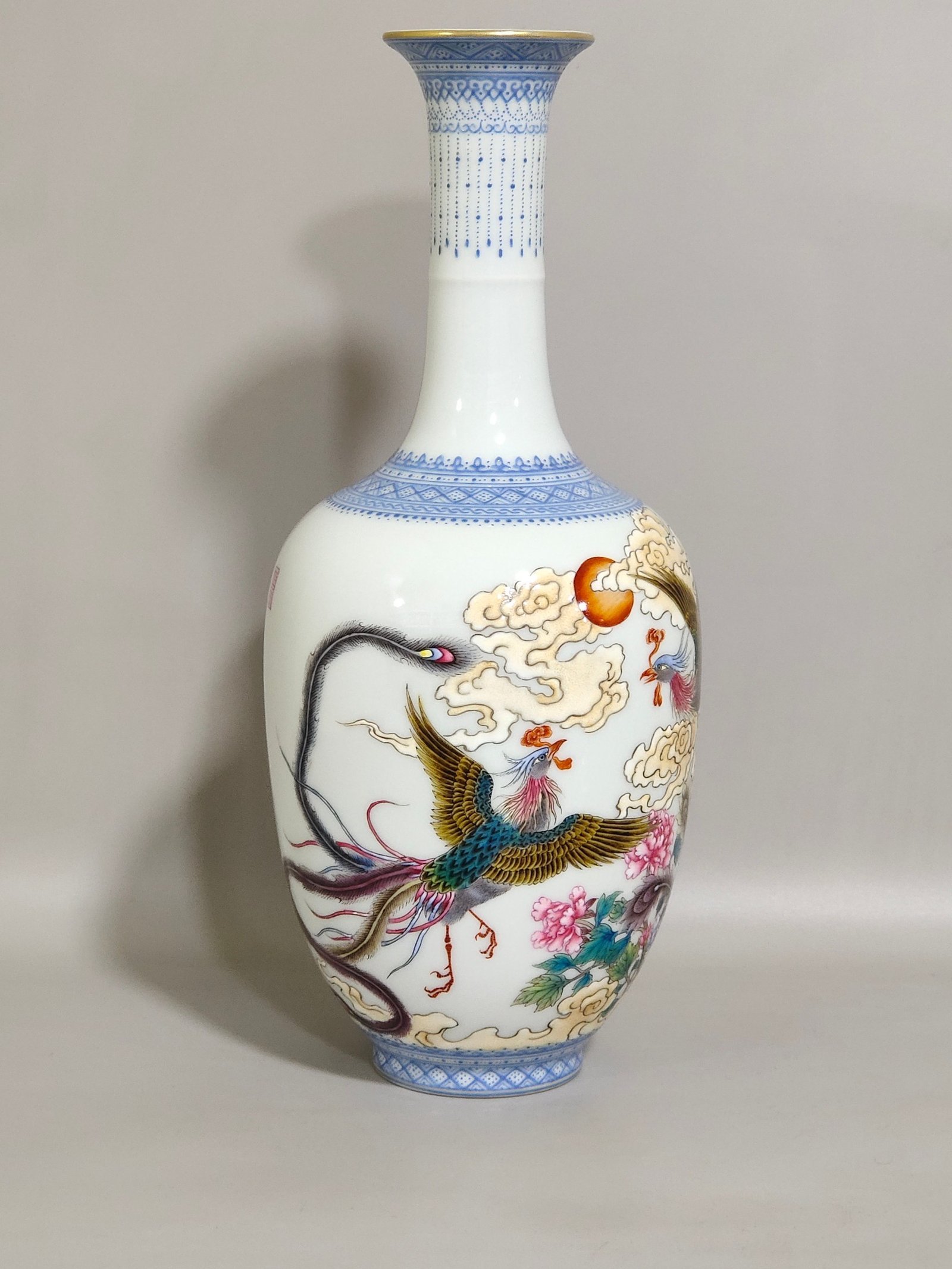 Qing Dynasty Qianlong green edged phoenix pierced peony inscribed long neck vase