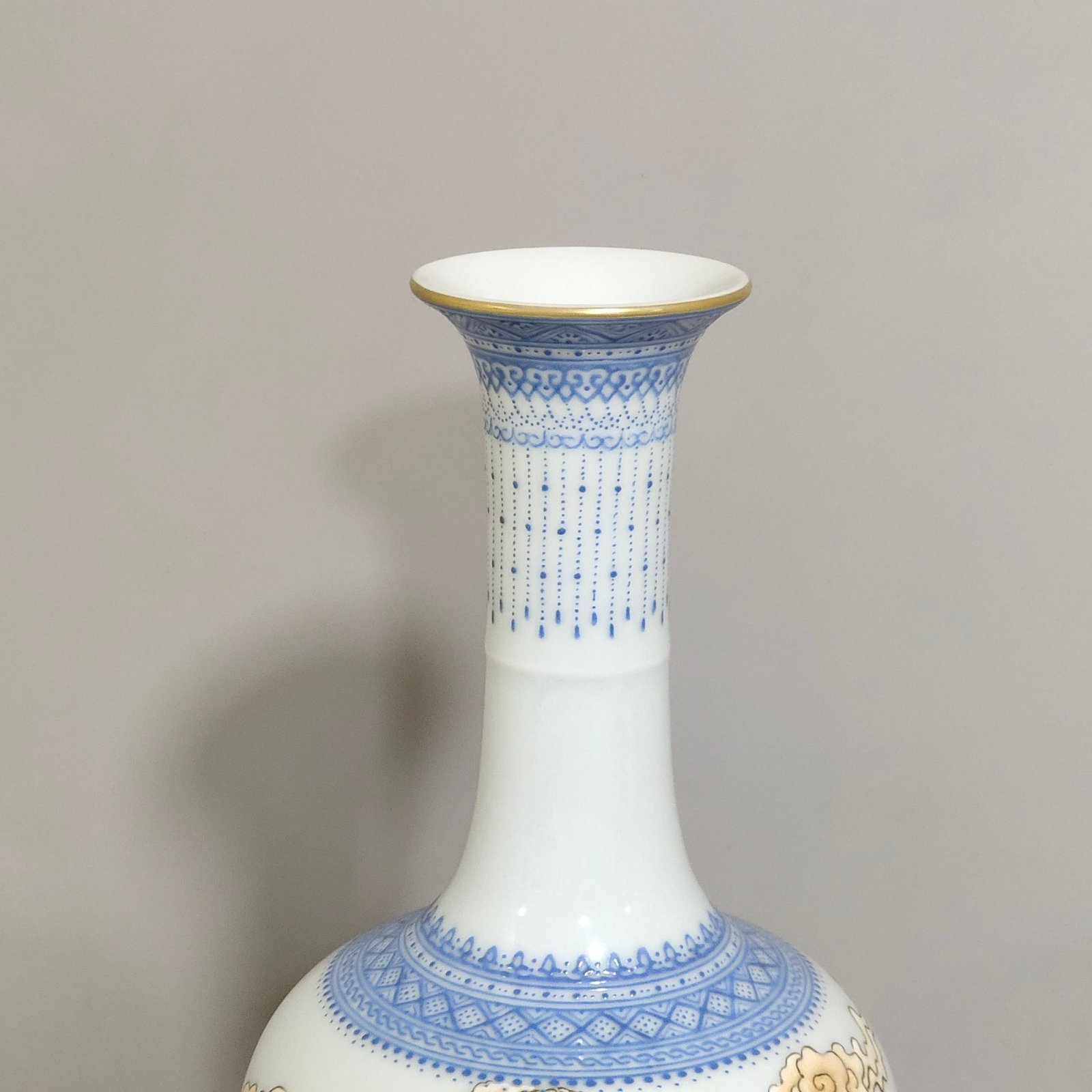 Qing Dynasty Qianlong green edged phoenix pierced peony inscribed long neck vase