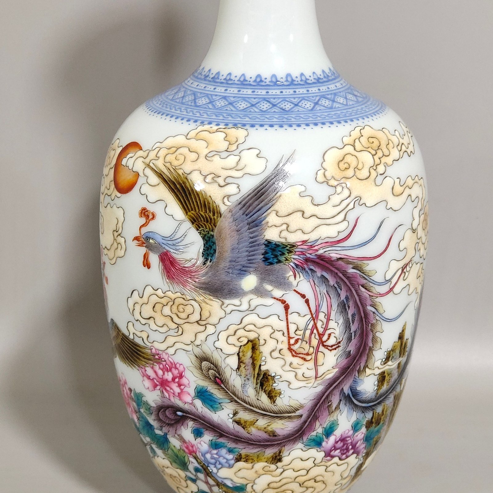 Qing Dynasty Qianlong green edged phoenix pierced peony inscribed long neck vase