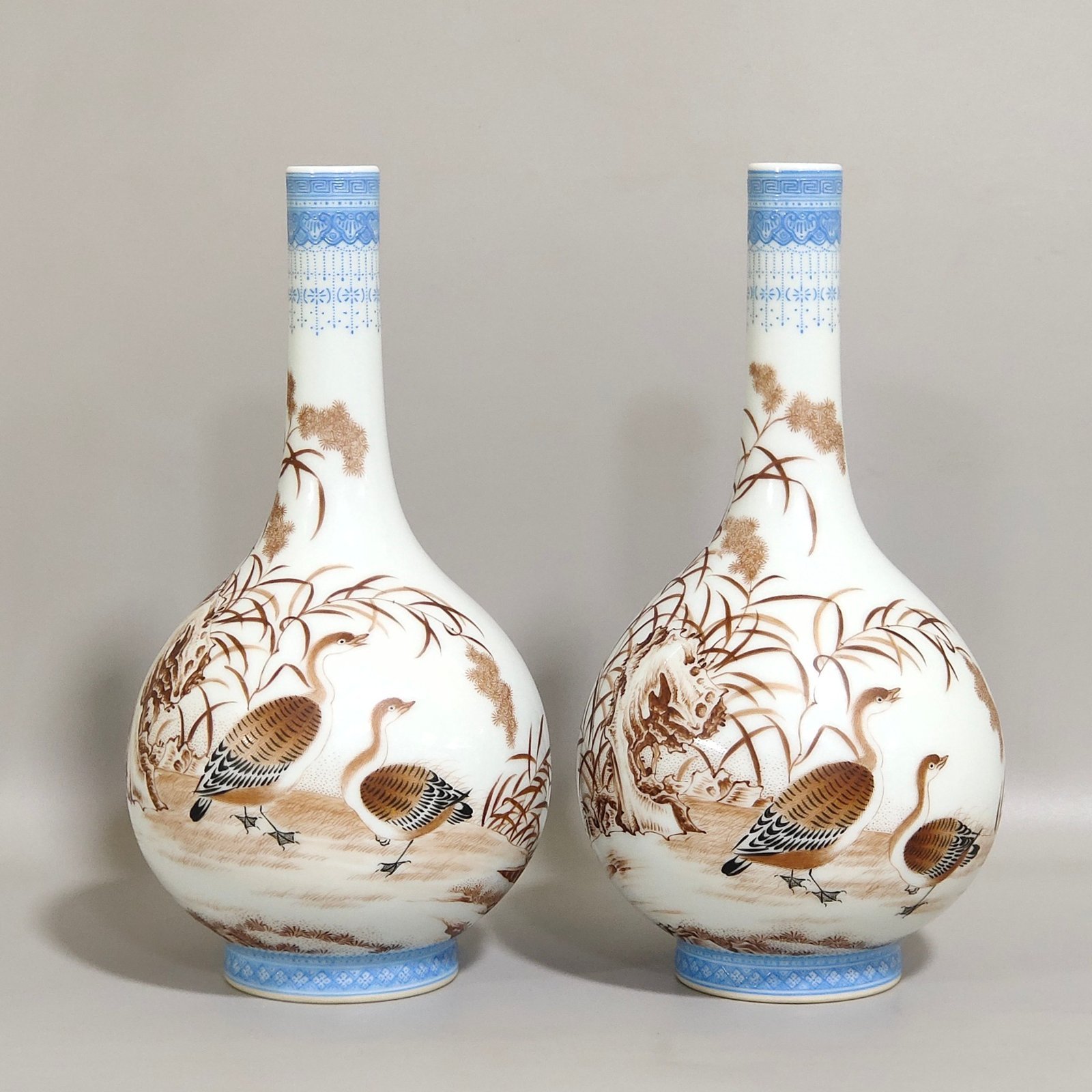 Qing Dynasty Qianlong green edged ink colored reed goose inscribed long neck vase