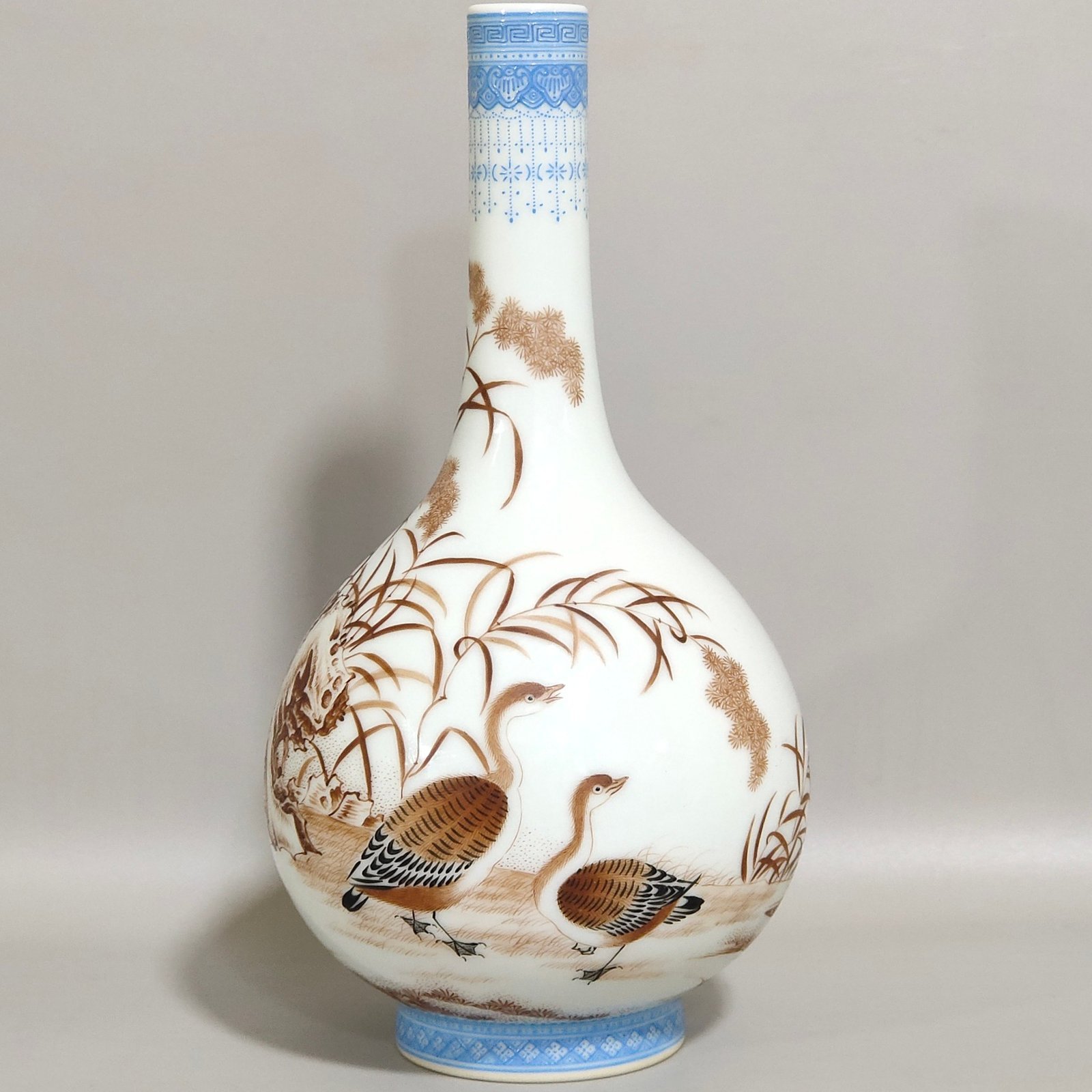 Qing Dynasty Qianlong green edged ink colored reed goose inscribed long neck vase