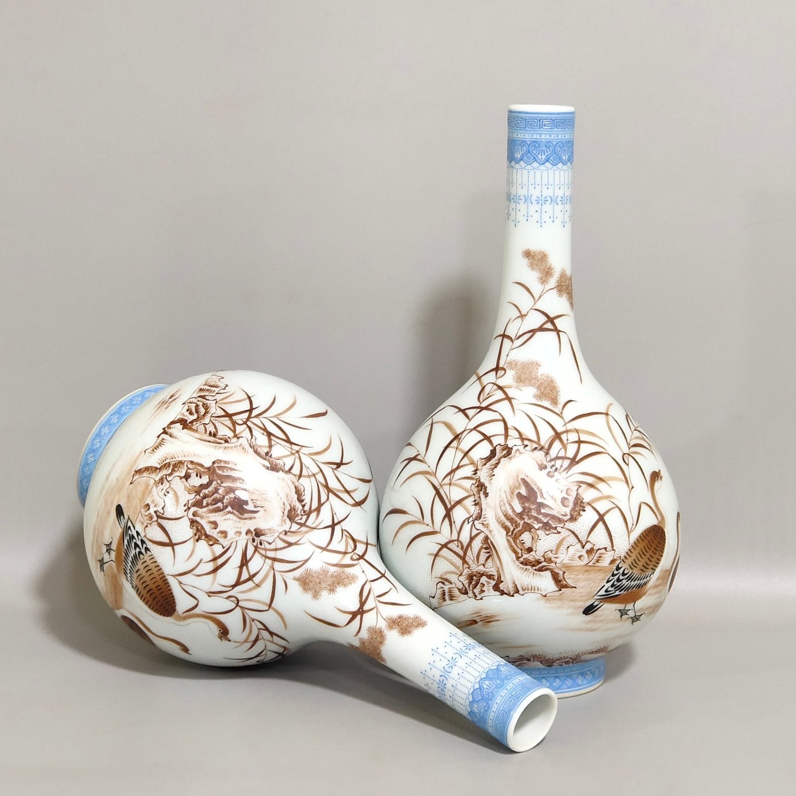 Qing Dynasty Qianlong green edged ink colored reed goose inscribed long neck vase