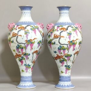 Qing Dynasty Qianlong green edge squirrel eating grape amphora