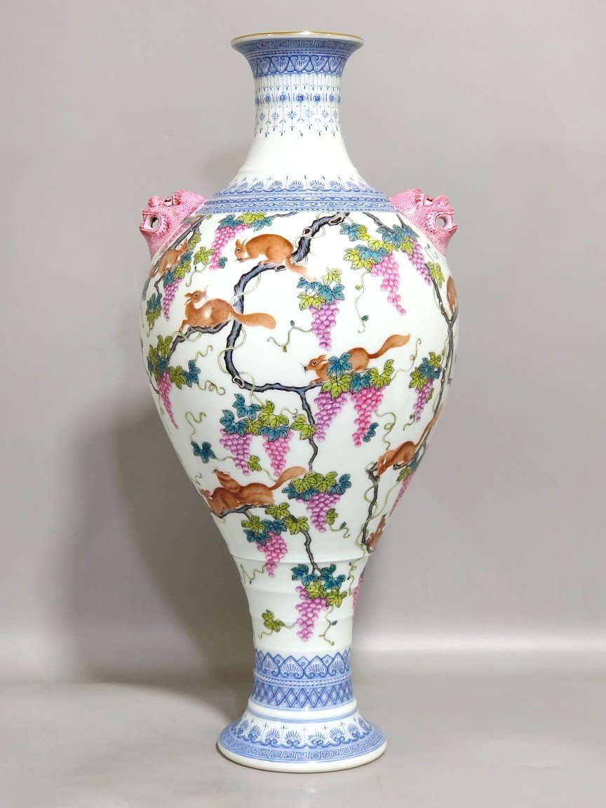Qing Dynasty Qianlong green edge squirrel eating grape amphora