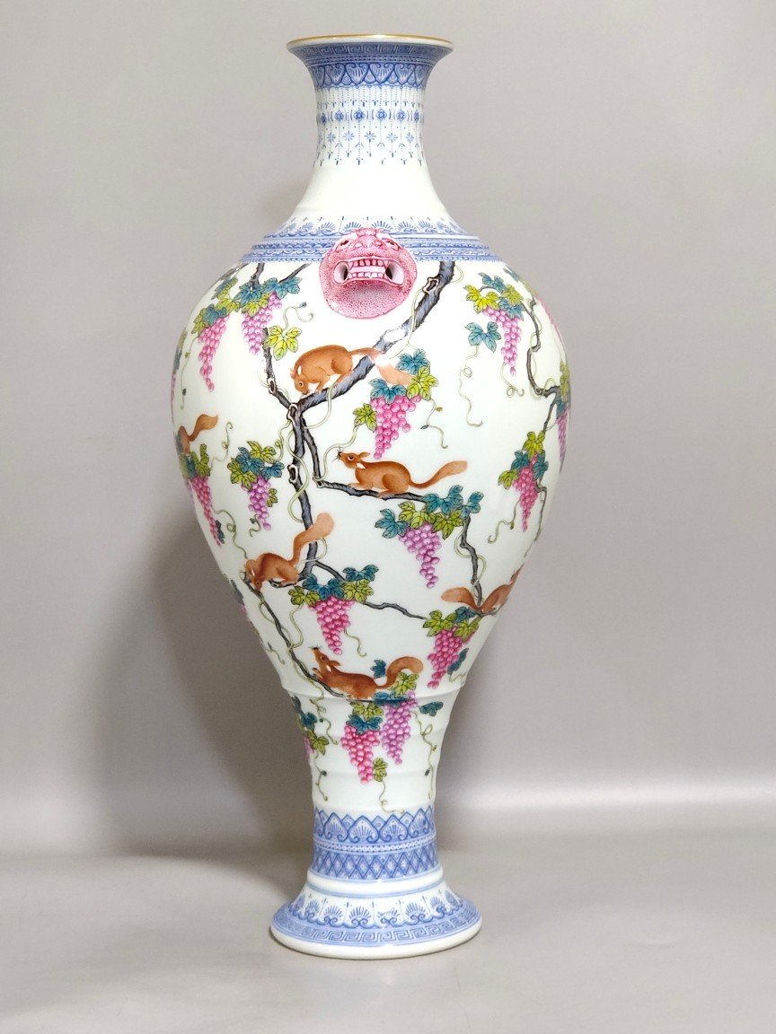 Qing Dynasty Qianlong green edge squirrel eating grape amphora
