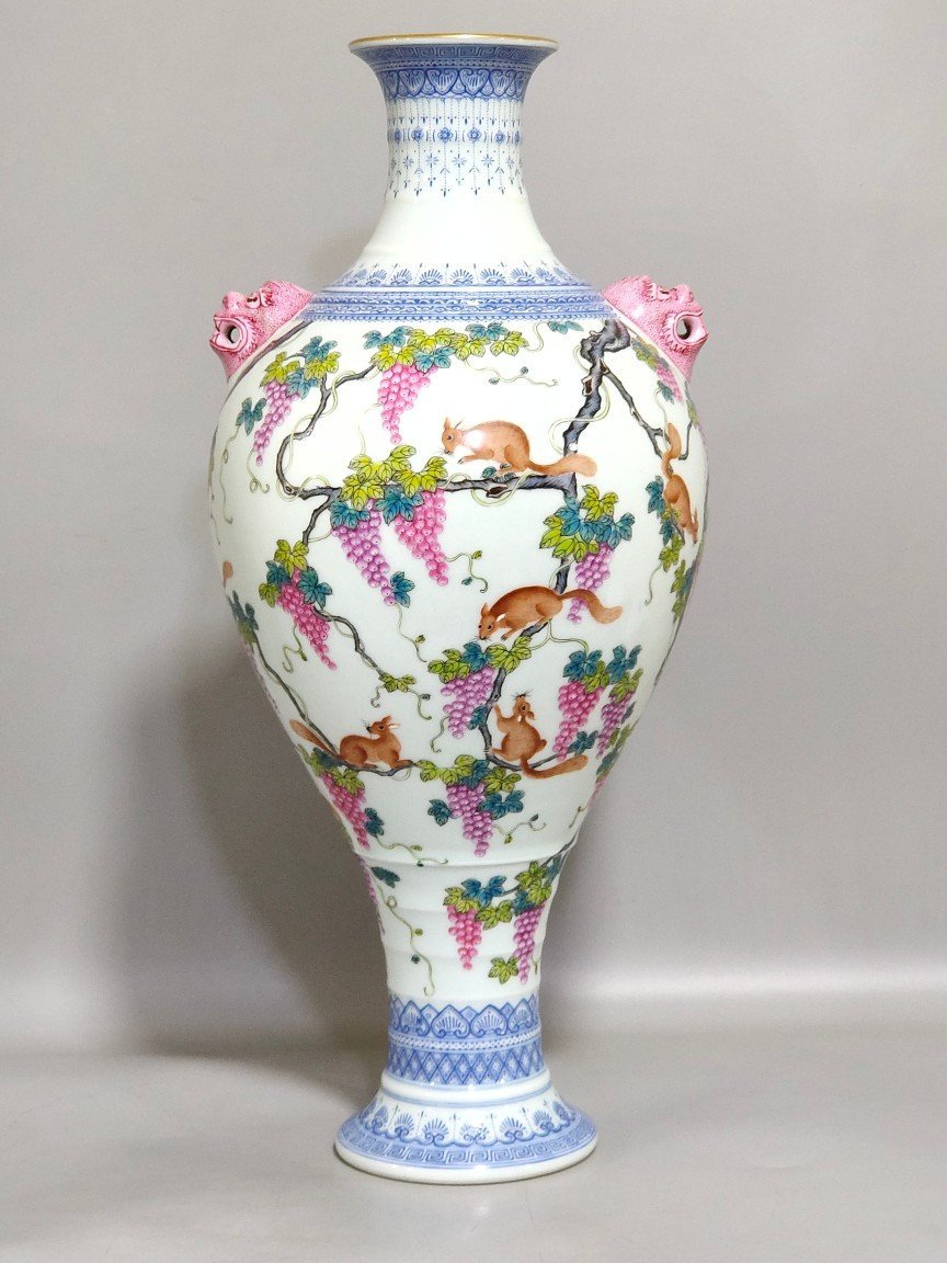 Qing Dynasty Qianlong green edge squirrel eating grape amphora