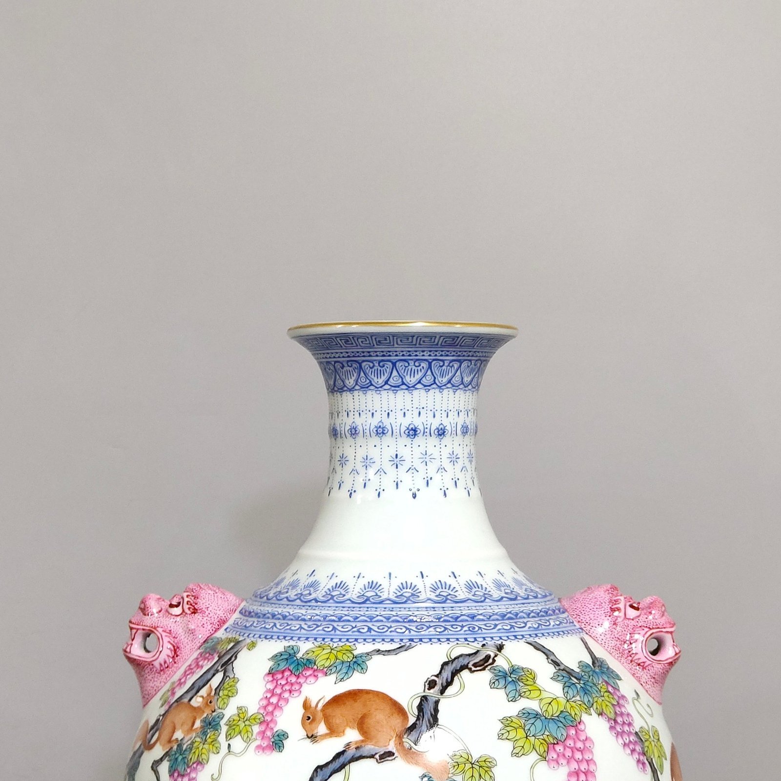 Qing Dynasty Qianlong green edge squirrel eating grape amphora