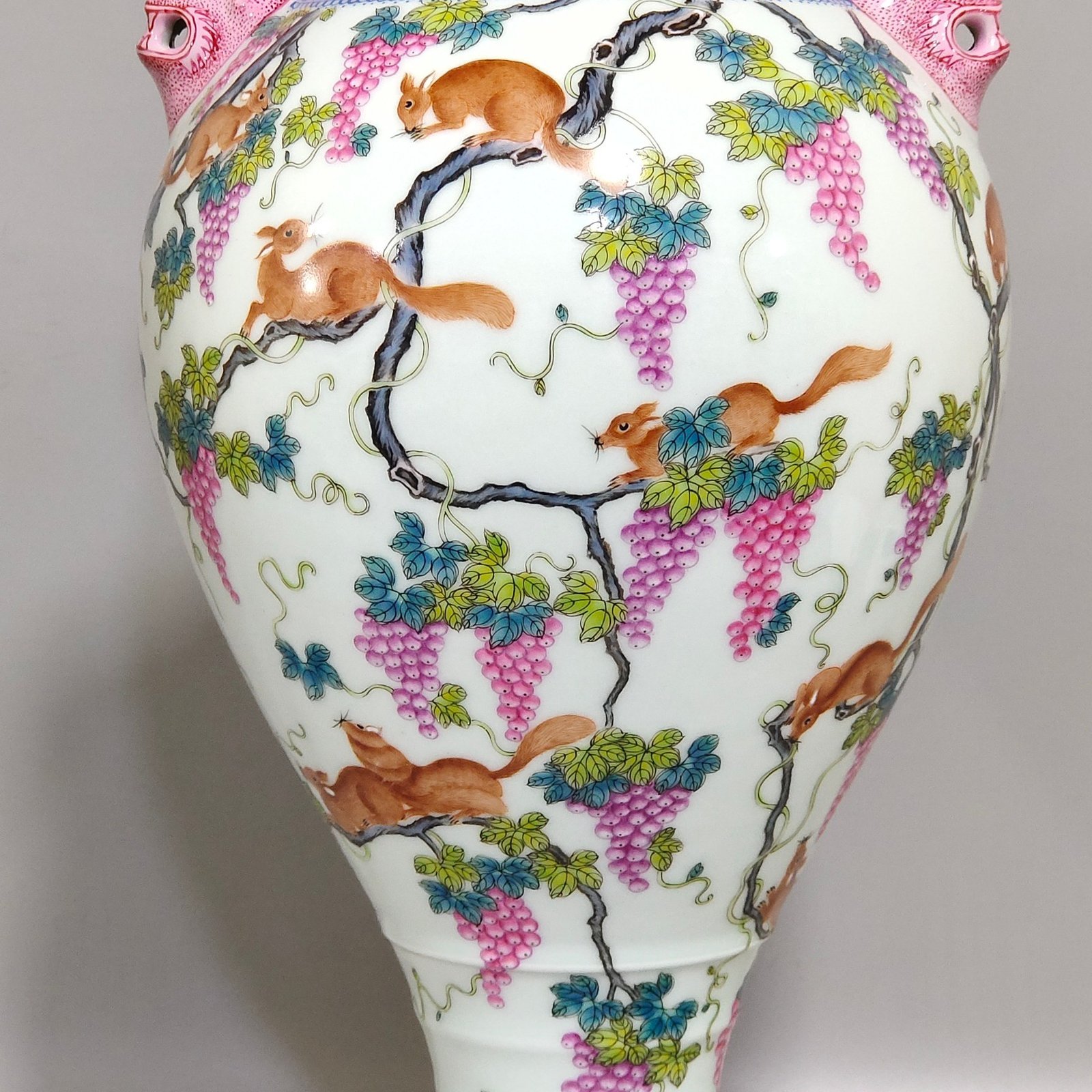 Qing Dynasty Qianlong green edge squirrel eating grape amphora