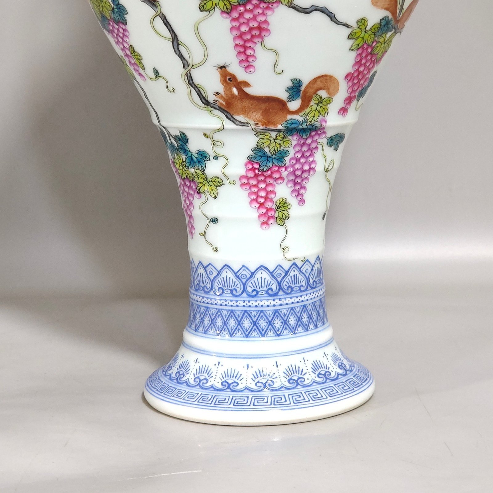 Qing Dynasty Qianlong green edge squirrel eating grape amphora