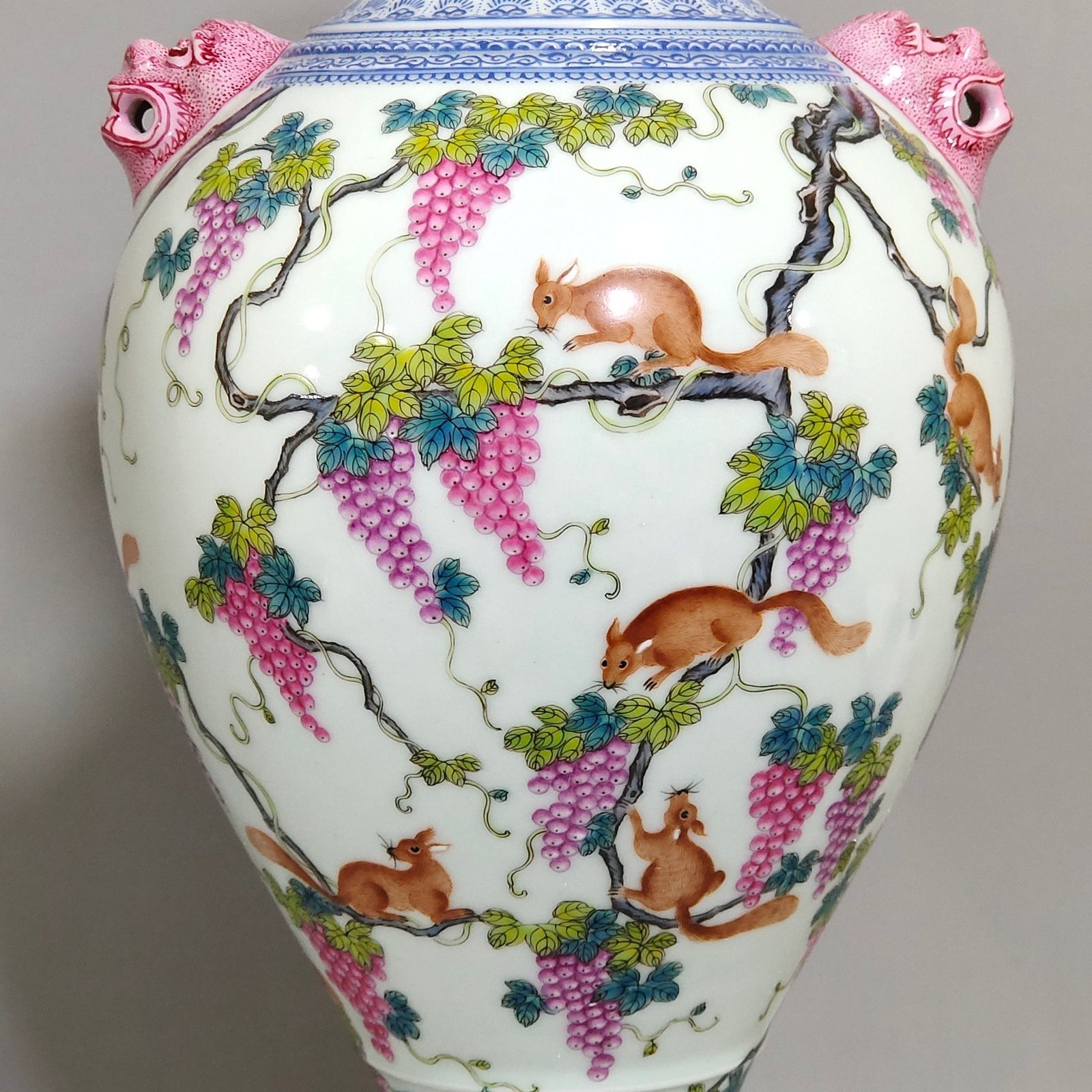 Qing Dynasty Qianlong green edge squirrel eating grape amphora