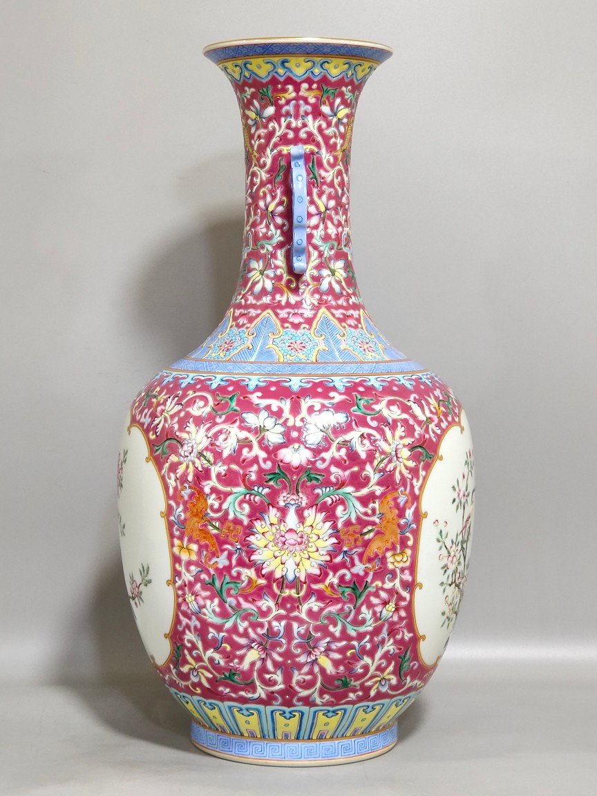 Qing Dynasty Qianlong rouge ground windowed flower and bird amphorae
