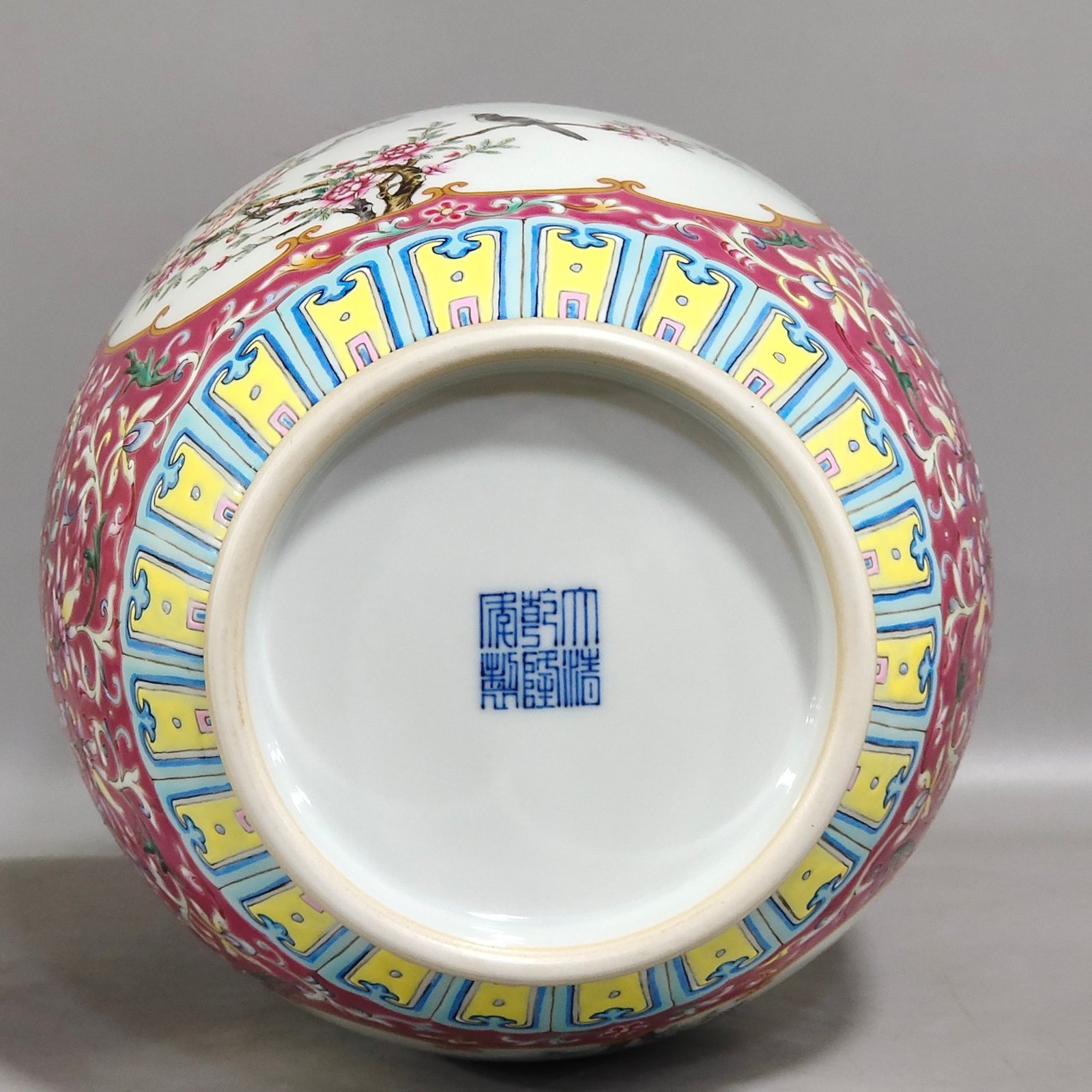 Qing Dynasty Qianlong rouge ground windowed flower and bird amphorae