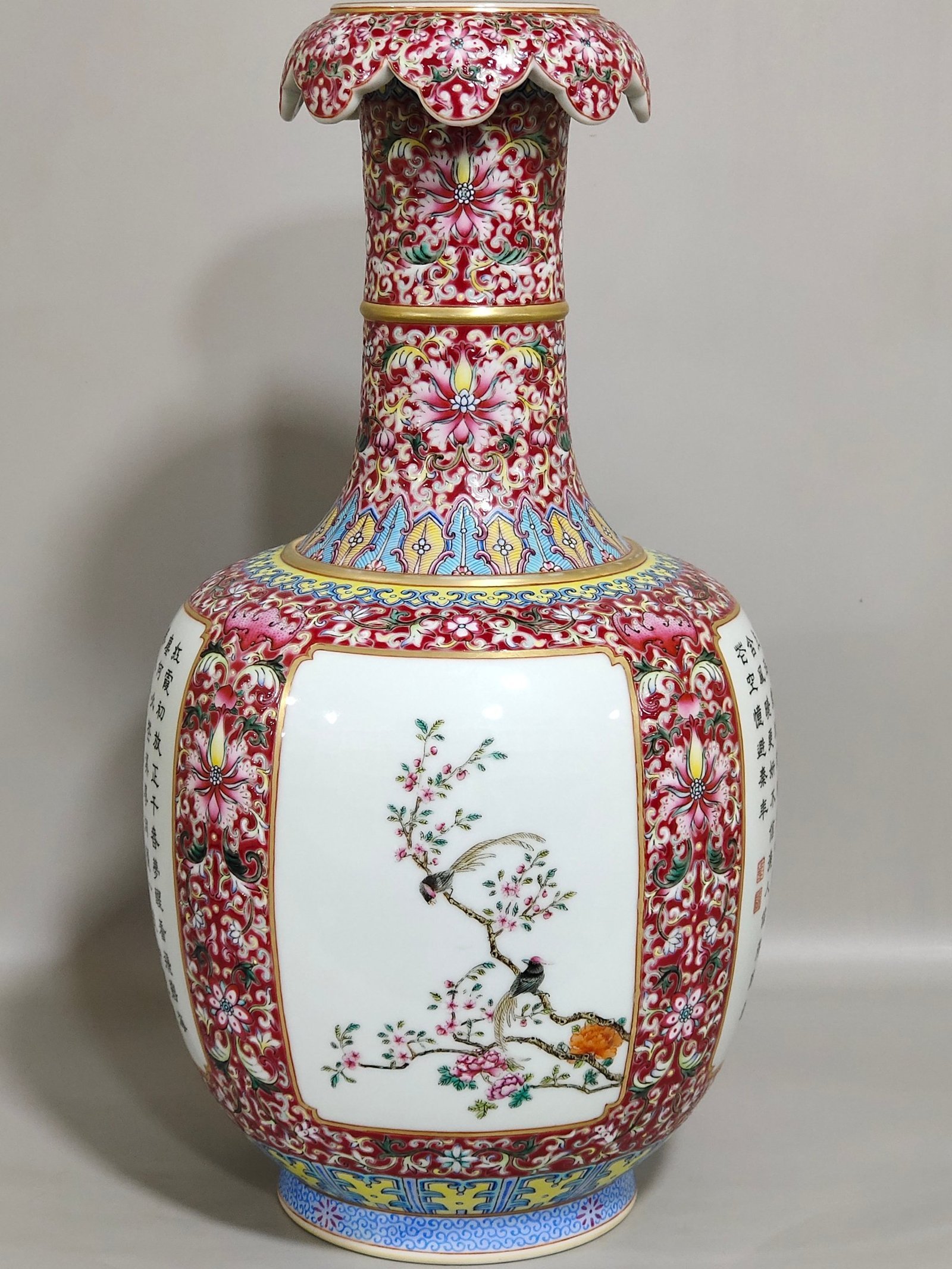 Qing Dynasty Qianlong a rouge ground window opening vase