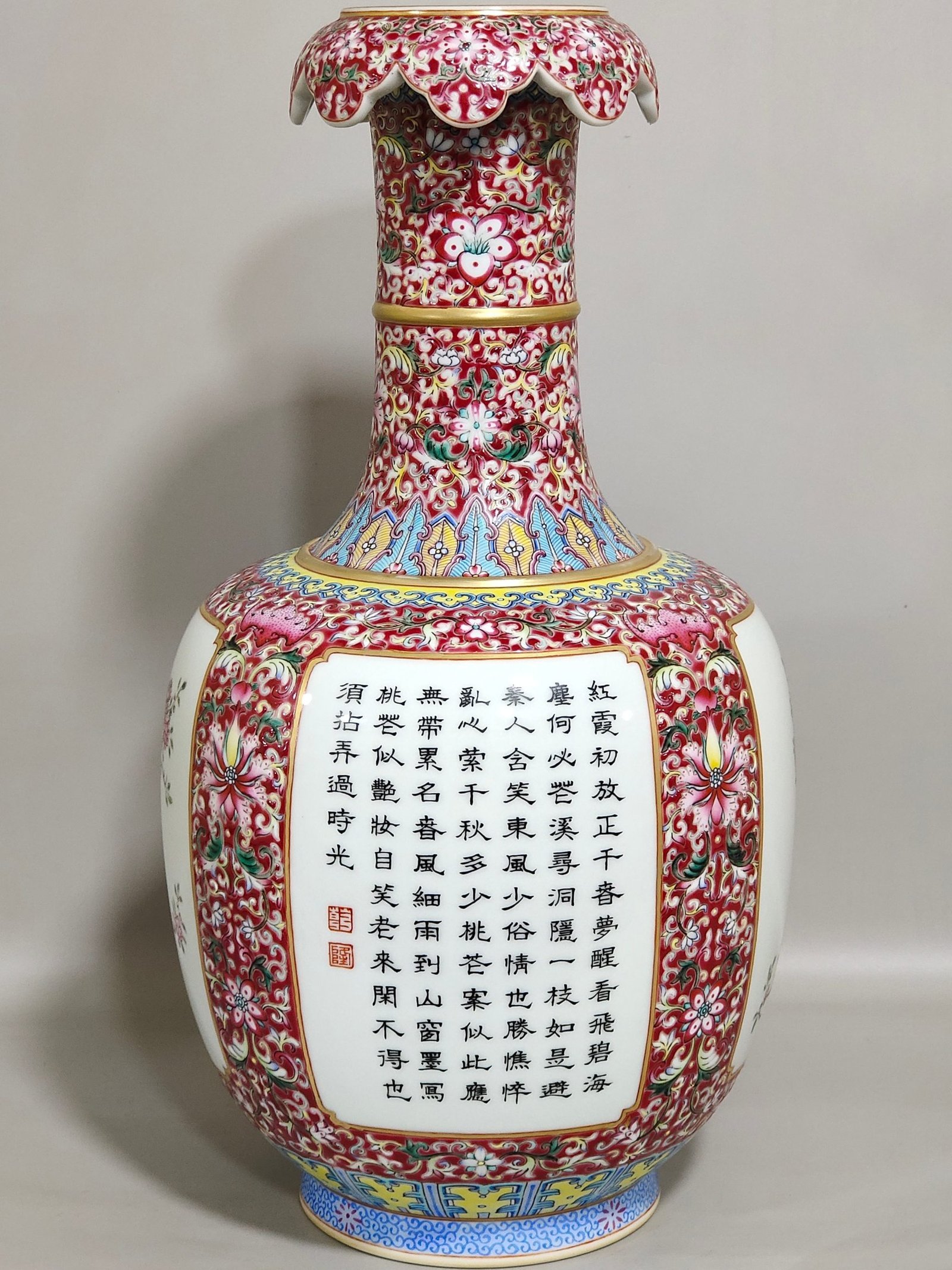 Qing Dynasty Qianlong a rouge ground window opening vase