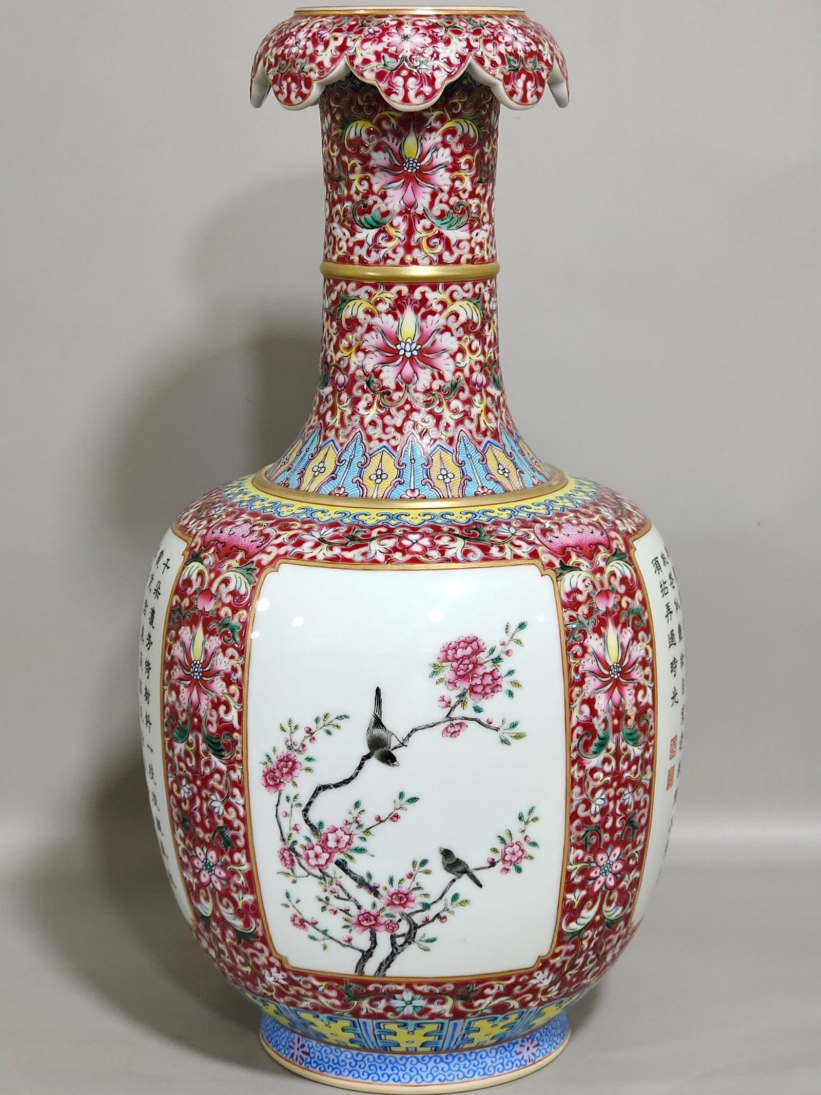 Qing Dynasty Qianlong a rouge ground window opening vase
