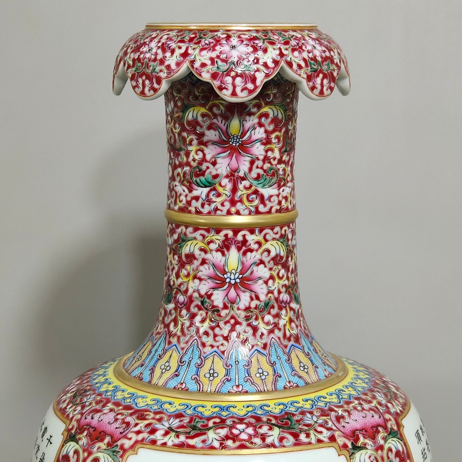 Qing Dynasty Qianlong a rouge ground window opening vase