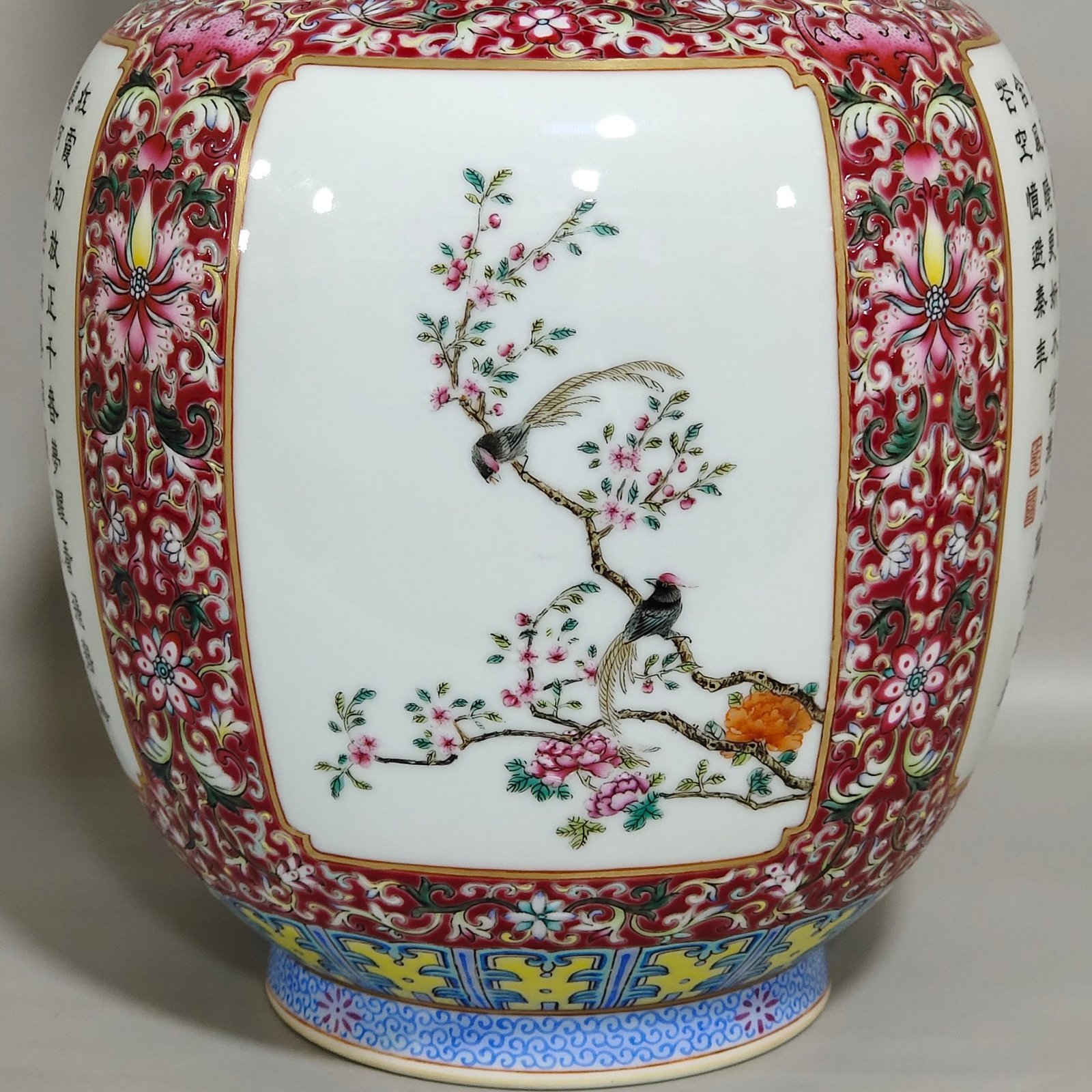Qing Dynasty Qianlong a rouge ground window opening vase