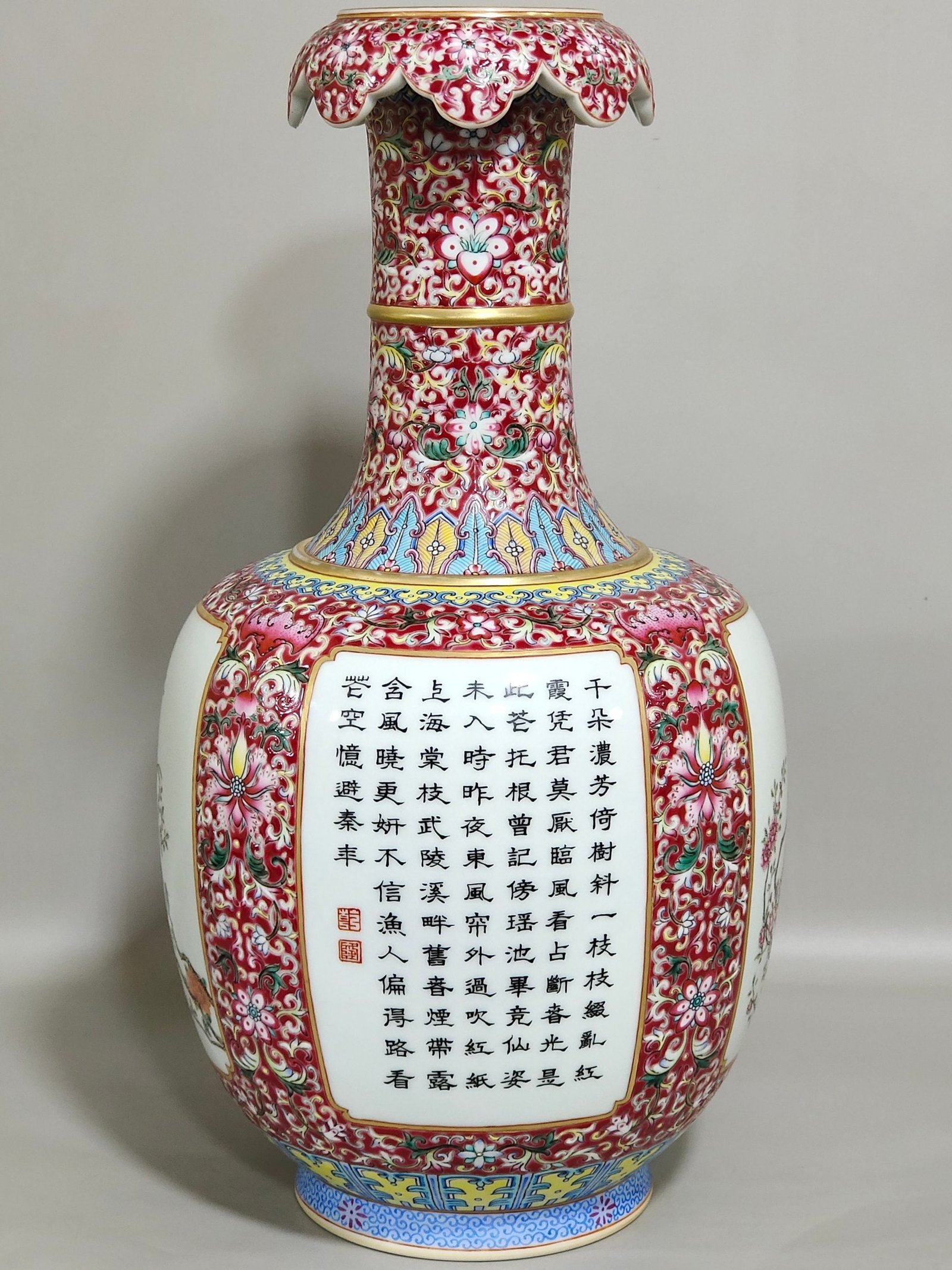 Qing Dynasty Qianlong a rouge ground window opening vase