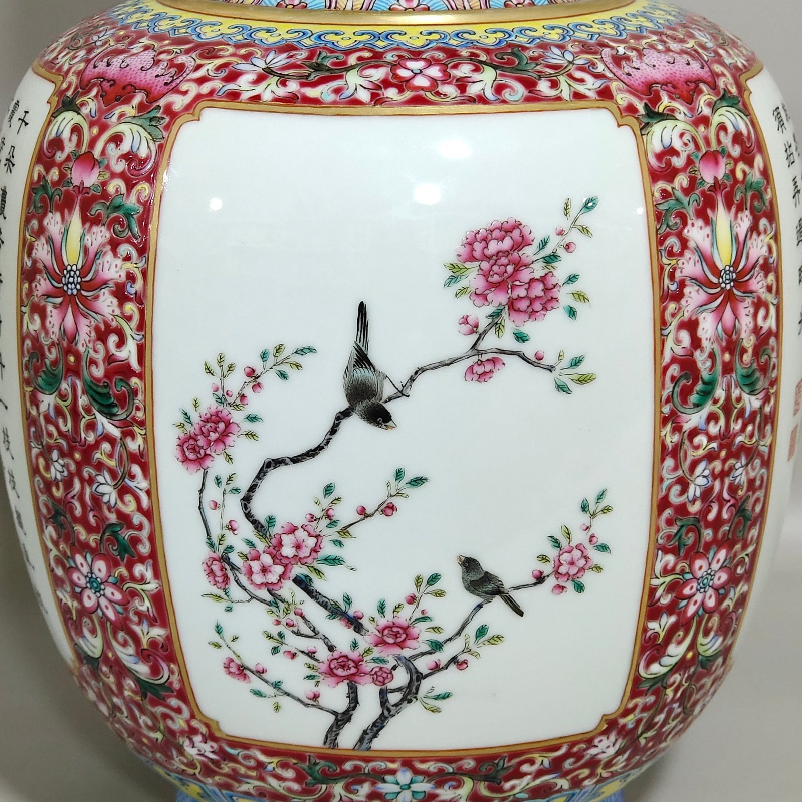 Qing Dynasty Qianlong a rouge ground window opening vase