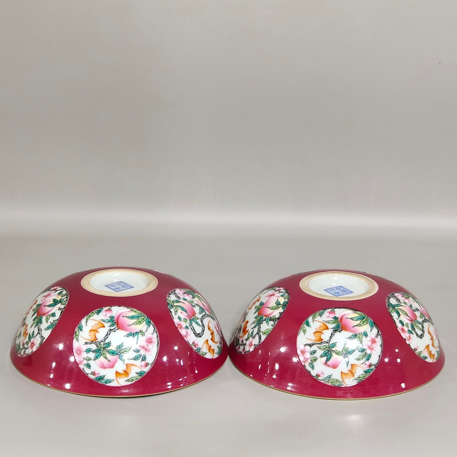Qing Dynasty Qianlong rouge red windowed longevity peach nest foot bowl